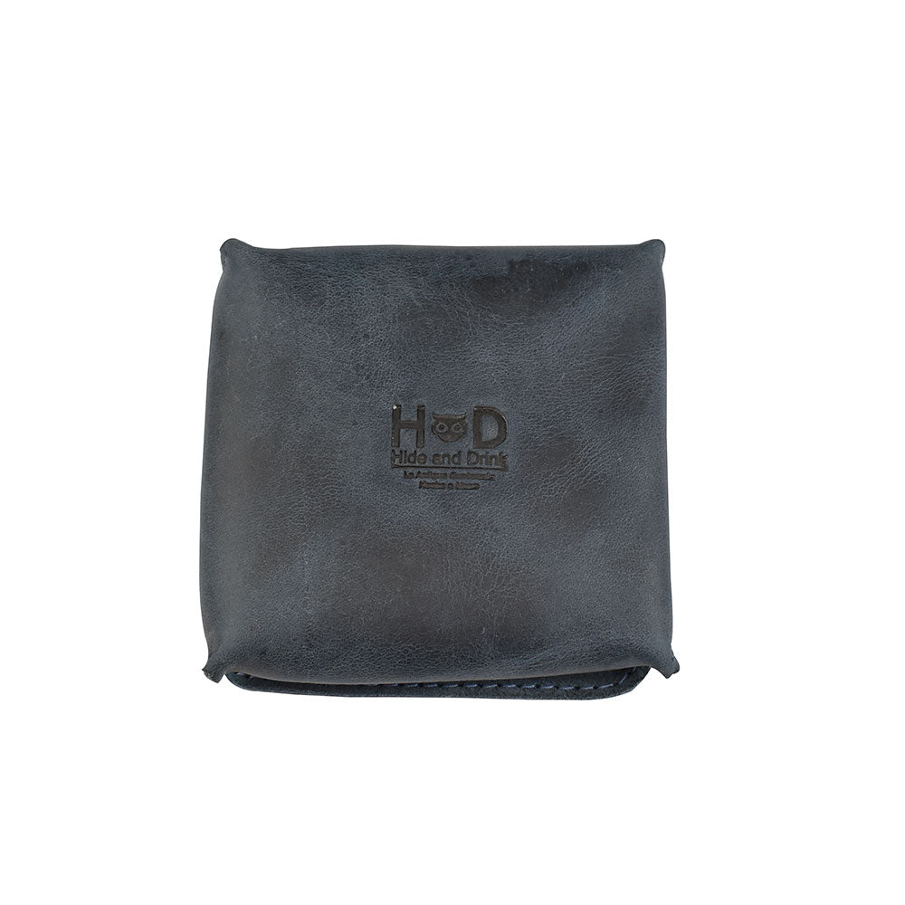 Front shot of a Hide & Drink Jewelry Pouch, featuring its robust full grain leather exterior. Offers ideal storage for rings, perfect as a unique wedding gift.