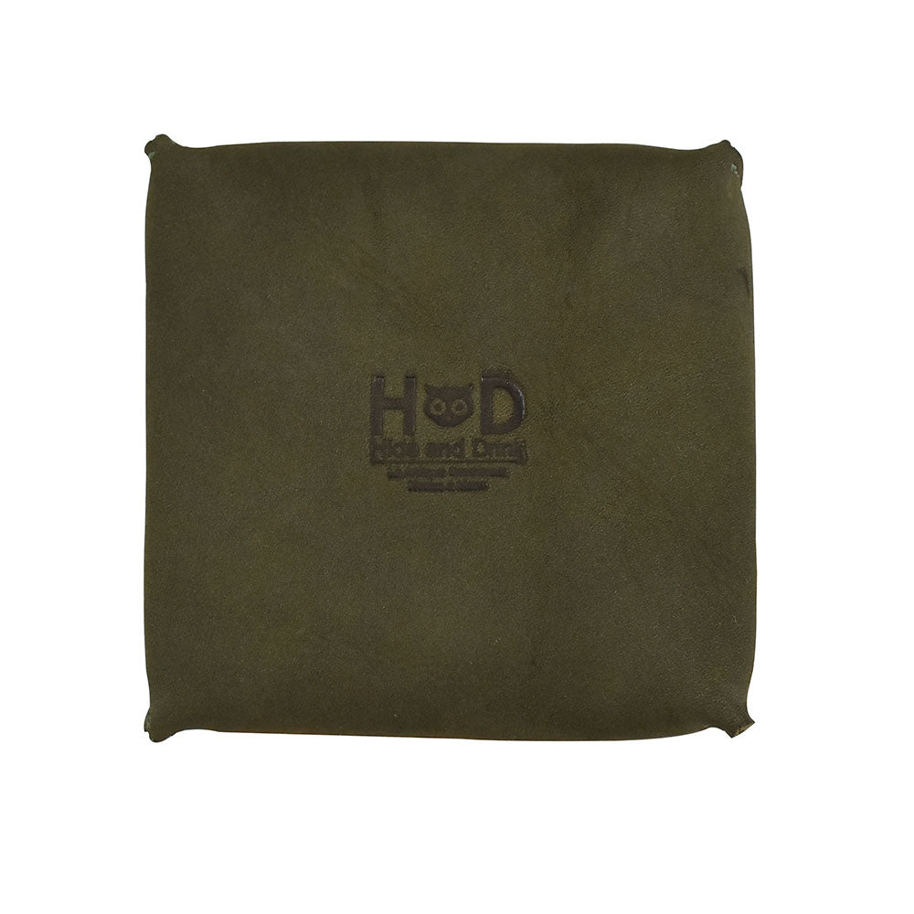 Front view of a Hide & Drink Jewelry Pouch featuring the artisan logo, crafted in full grain leather, suitable for storing precious articles. Ideal for wedding occasions.