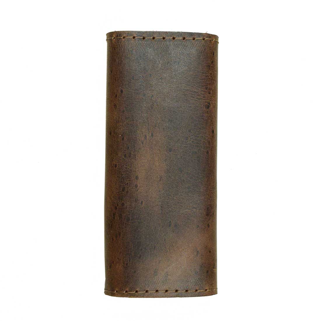 A detailed view of the Hide & Drink Handle Grip Replacement, emphasizing its texture and craftsmanship that enhance any luggage bag. This Full Grain Leather product is emblematic of the brand's commitment to handmade quality, making it an excellent Handle Grip Replacement for travelers.