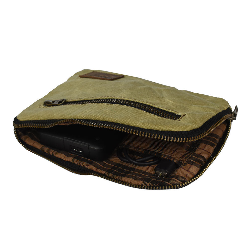 Interior view of Hide & Drink's Zipper Gear Pouch showcasing its spacious design for organizing cables and accessories, crafted from water resistant waxed canvas for durability, ideal as a multi-purpose bag.