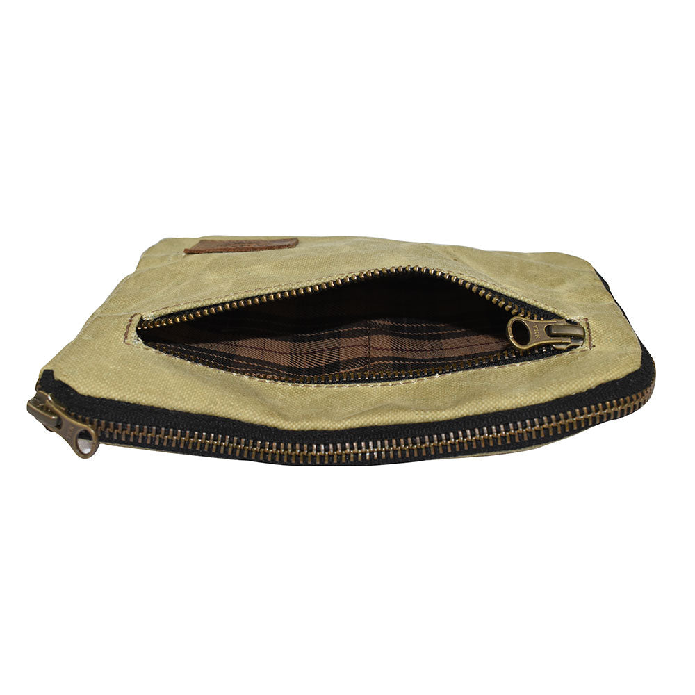 Hide & Drink's Zipper Gear Pouch open, revealing its interior plaid lining and compartments, designed for organizing various items while being crafted from water resistant waxed canvas.