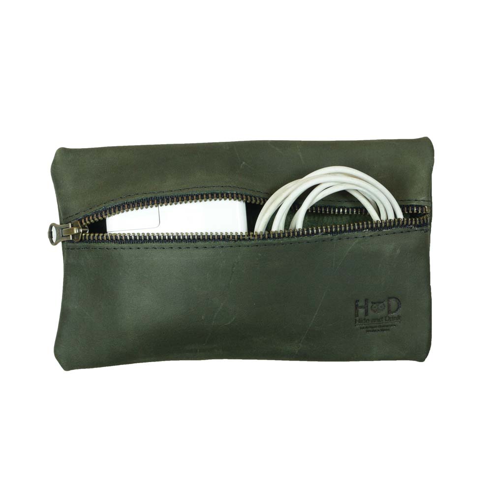 Hide & Drink Utility Cord Pouch with a focus on the stitching and materials used, illustrating its craftsmanship. This pouch acts as an all-purpose utility & charger case for MacBook, iPad & Laptop while effectively serving as a cable organizer, made in La Antigua Guatemala & Oaxaca Mexico.