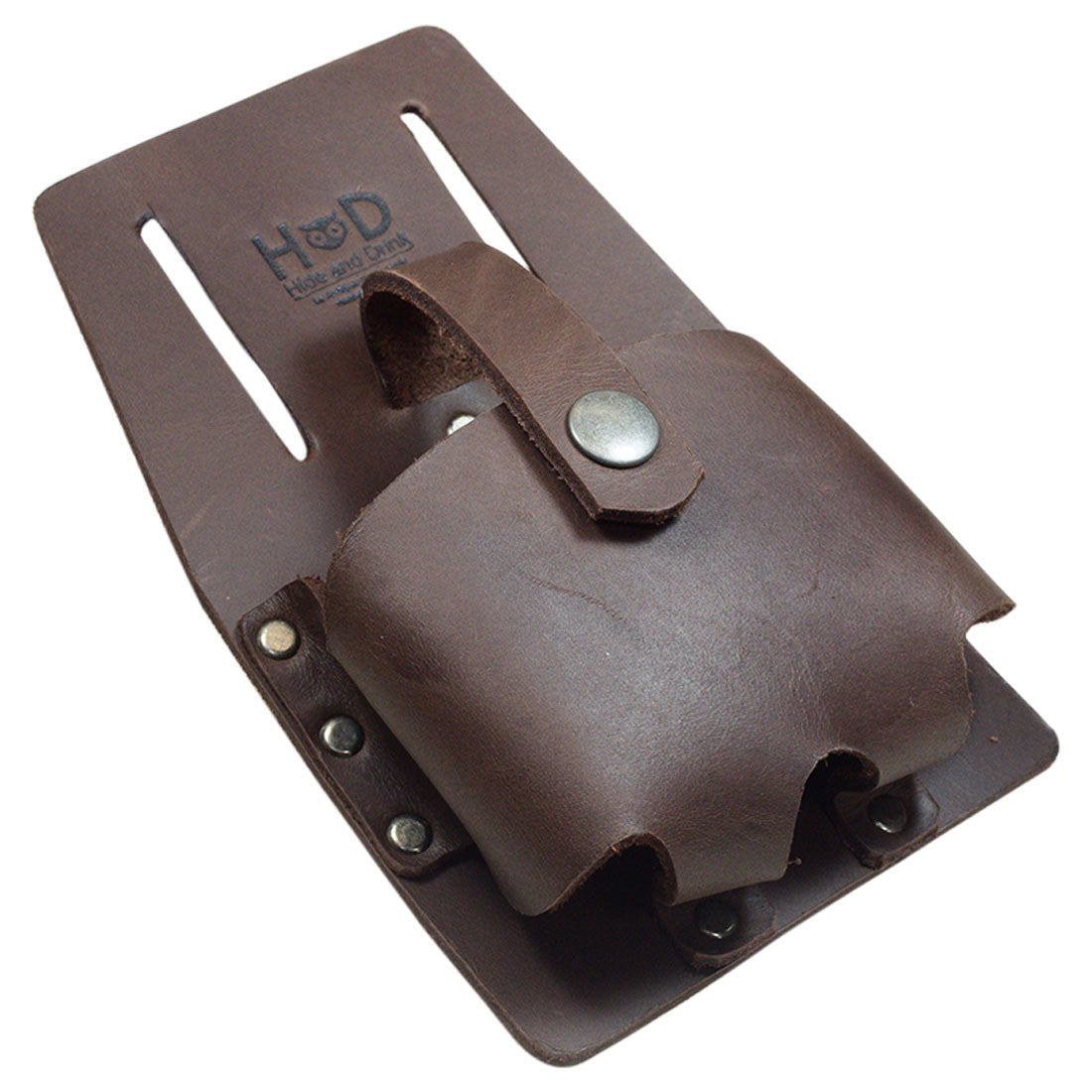 Hide & Drink's Large Tape Holder, elegantly designed for functionality and style. This thick full grain leather tool pouch is perfect for measuring tapes, illustrating the quality of artisan handmade products from La Antigua Guatemala & Oaxaca Mexico.