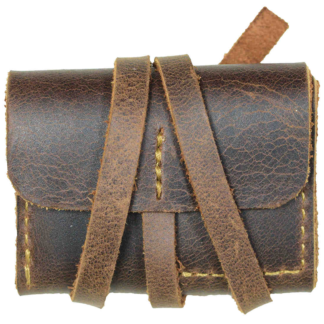 Hide & Drink Guitar Pick Roll neatly wrapped in leather straps, emphasizing its rustic charm and durability. This Guitar Pick Roll, a great Guitarist Gift and Musician Accessory, is crafted from Full Grain Leather with Small Batch Production techniques. Hand Cut and Hand Sewn by artisans in La Antigua Guatemala & Oaxaca Mexico.