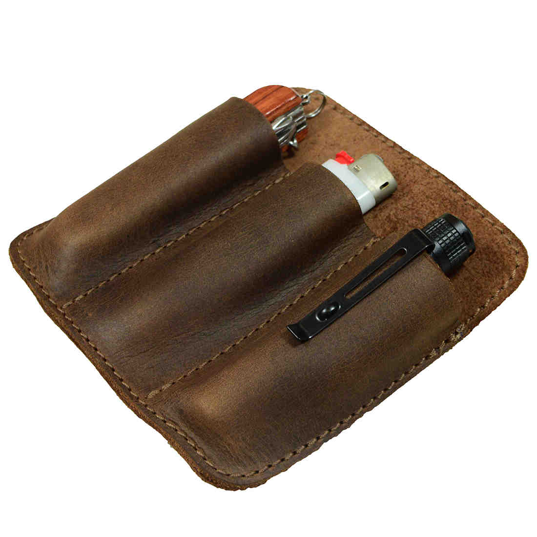Side view of the Hide & Drink Minimalist Tool Pocket showing its practical interior. Crafted from premium Full Grain Leather, this Tool Pocket Pouch is an ideal blend of style and function. Artisan handmade in La Antigua Guatemala, promoting ethical small batch production.
