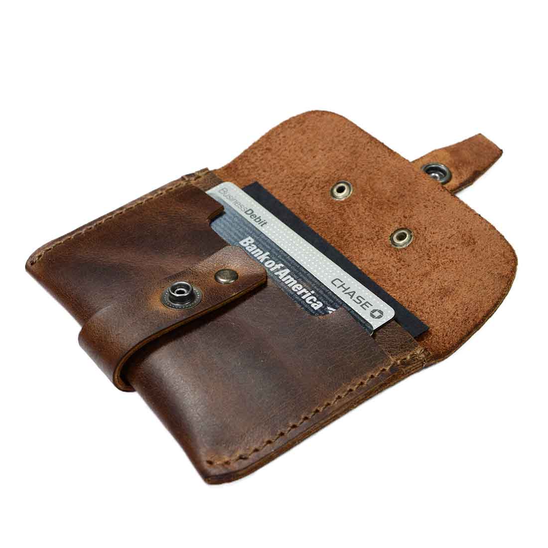 Interior view of Hide & Drink's Credit Card Holder showing card slots, crafted from premium Full Grain Leather. This handmade, minimalist front pocket wallet represents top-notch artisan effort, ensuring functionality and style for your cards.