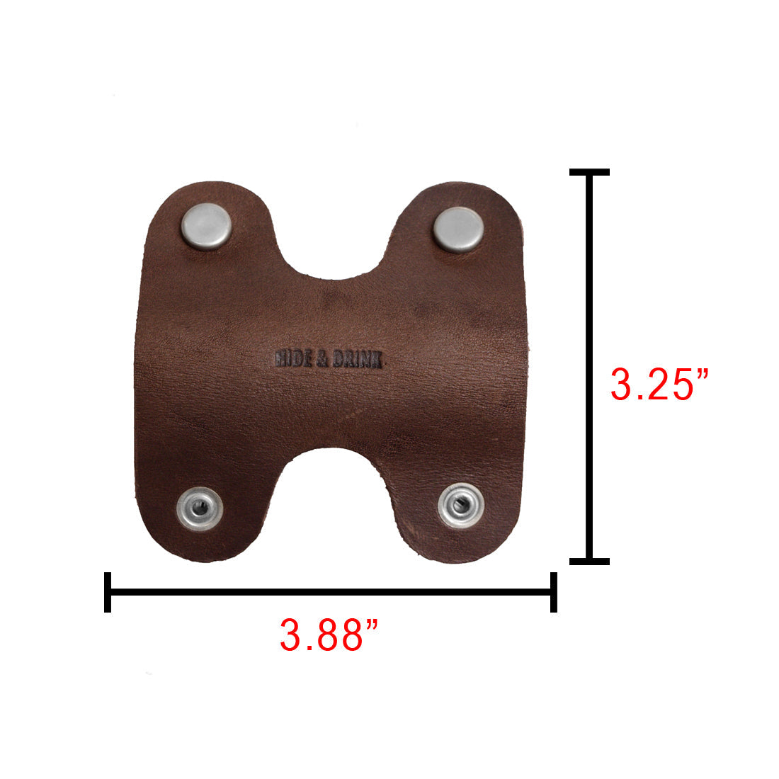 Measuring dimensions of the Wrap Cord Keeper by Hide & Drink, emphasizing its practicality as a cable organizer holder. Designed from quality full grain leather, this artisan piece is individually crafted in La Antigua Guatemala & Oaxaca Mexico.