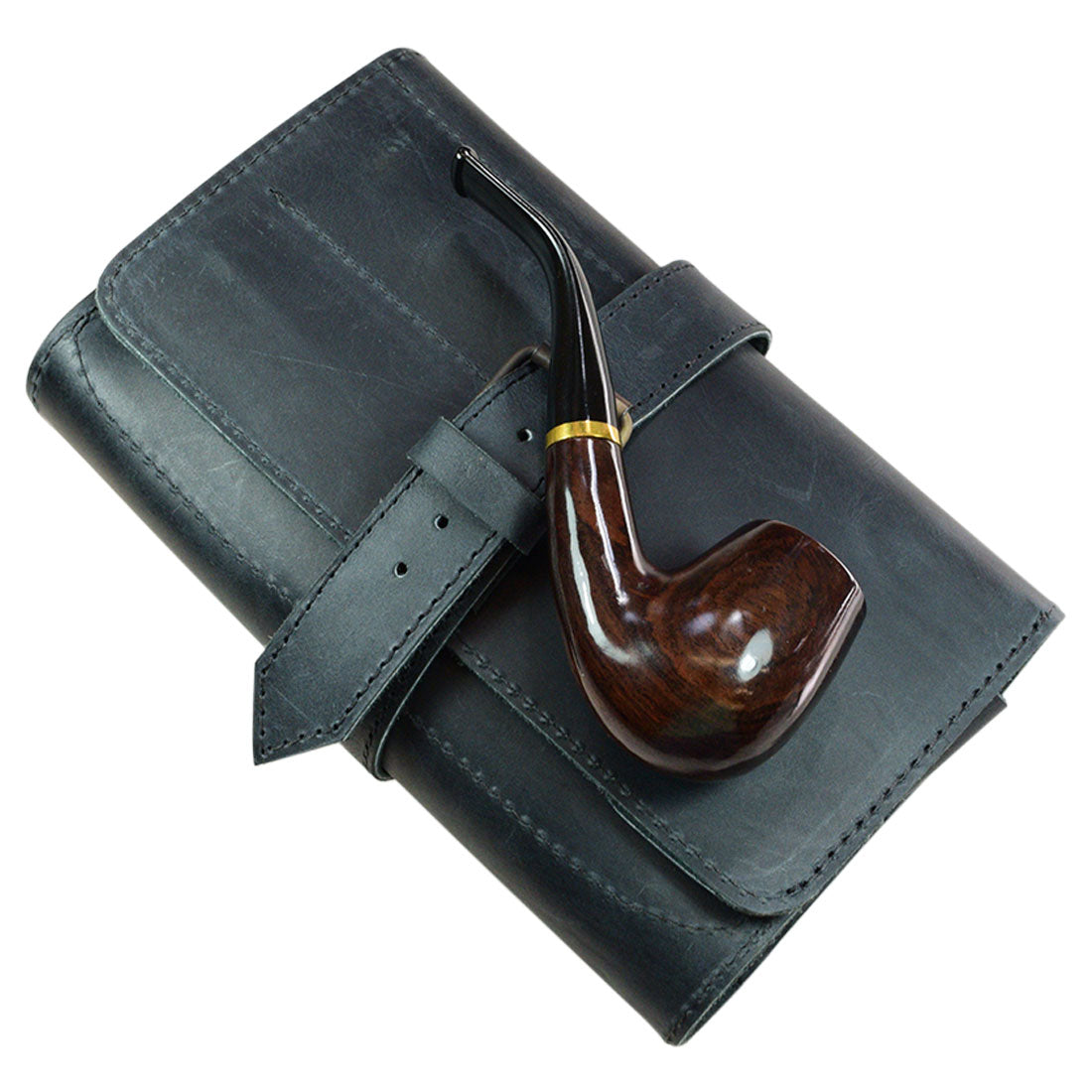 Close-up of Hide & Drink's Double Pipe Tobacco Pouch with a pipe resting on top, emphasizing its Full Grain Leather quality. Ideal for the artisan smoker, this pouch highlights the hand cut and hand sewn details crafted in La Antigua Guatemala.
