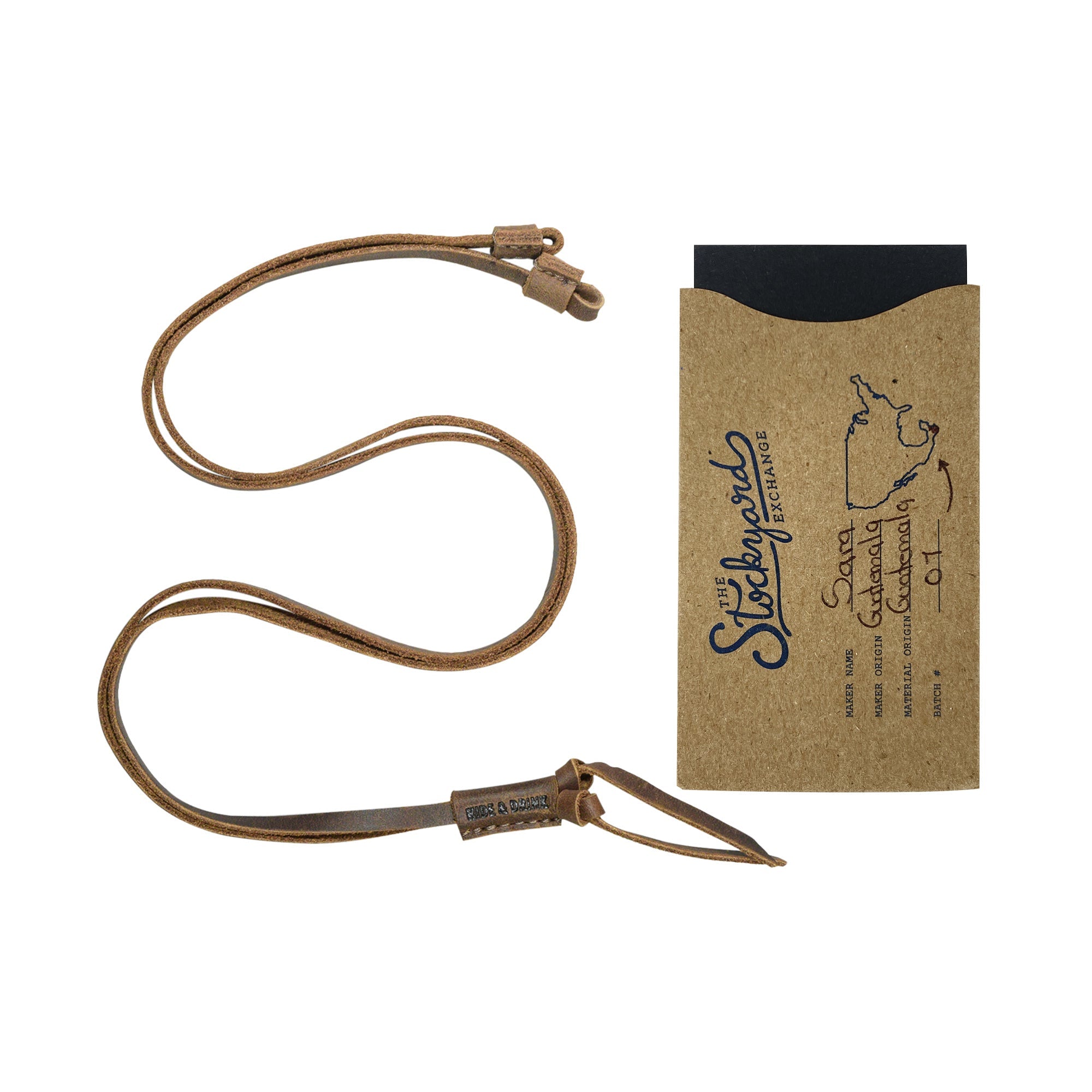 Hide & Drink glasses strap presented with its original packaging, underscoring the quality and care in its handcrafted design. This Glasses Strap, made from adjustable Full Grain Leather, integrates artisan techniques in small batch production, perfect for anyone seeking stylish everyday accessories.