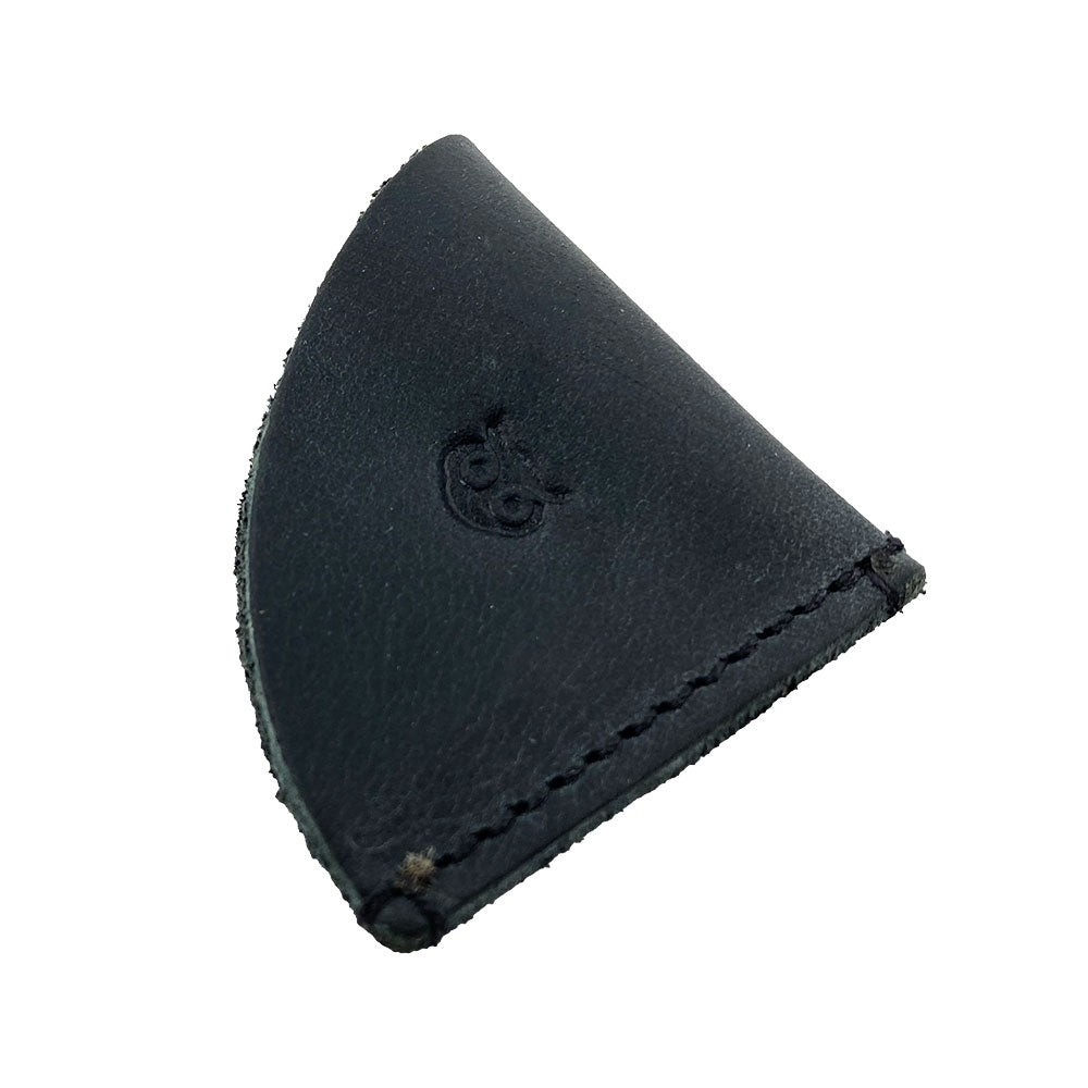 Chic black leather corner bookmark from Hide & Drink, included in the Corner Bookmark 3-Pack, designed for elegant book marking. Made from high-quality full grain leather, this artisan piece features hand cut and hand sewn details and reflects small batch production craftsmanship from La Antigua Guatemala & Oaxaca Mexico.