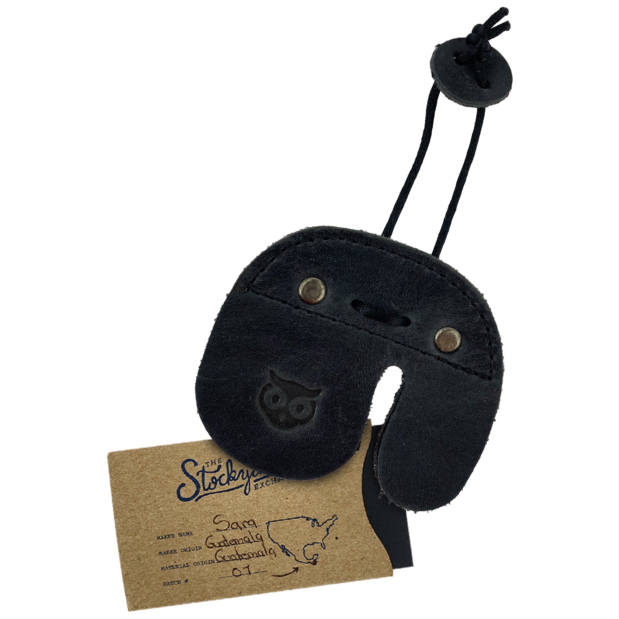 The Hide & Drink Left Handed Archery Finger Protector displayed with care instructions. This stylish Archery Finger Tab acts as a Protect Guard for Recurve Bows, combining modern design with traditional craftsmanship in Full Grain Leather. Ideal for sports & outdoors, it's a great addition to your shooting practice gear from StockyardX.
