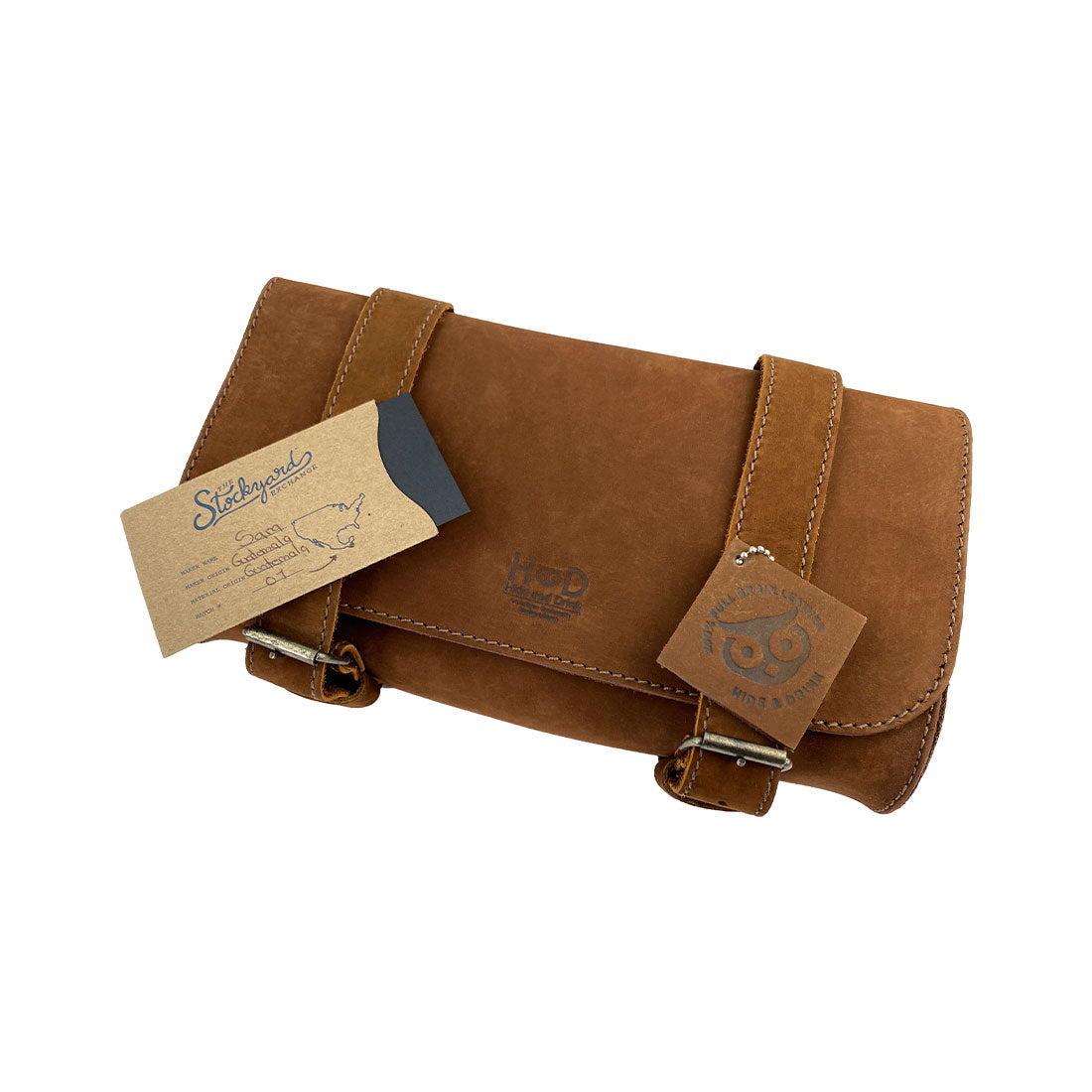 Hide & Drink Leather Motorcycle Tool Bag in its elegant design, made from authentic Full Grain Leather, suited for enthusiasts requiring a practical Biker Bag for Tools and Essentials. This classic Handlebar Bag with Adjustable Straps serves as a perfect Tool Organizer, handmade with care in La Antigua Guatemala & Oaxaca Mexico.