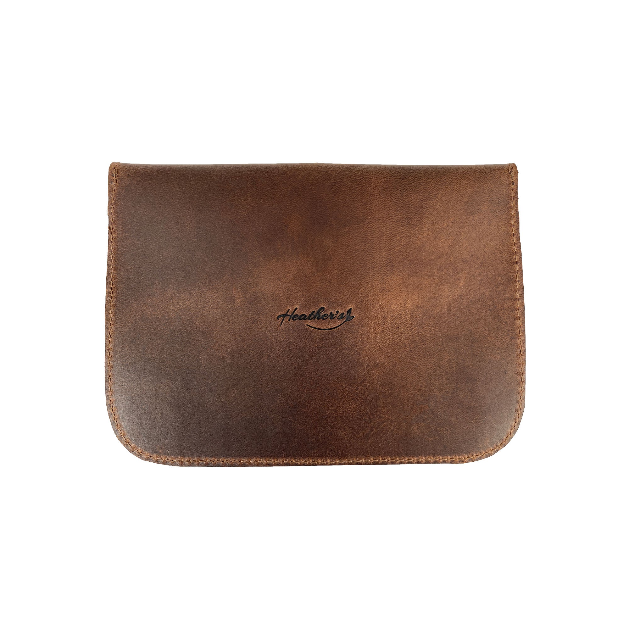 Heather's Flower Card Wallet filled with cash and coins, showcasing its practical use. This Full Grain Leather wallet is handmade by artisans in La Antigua Guatemala.