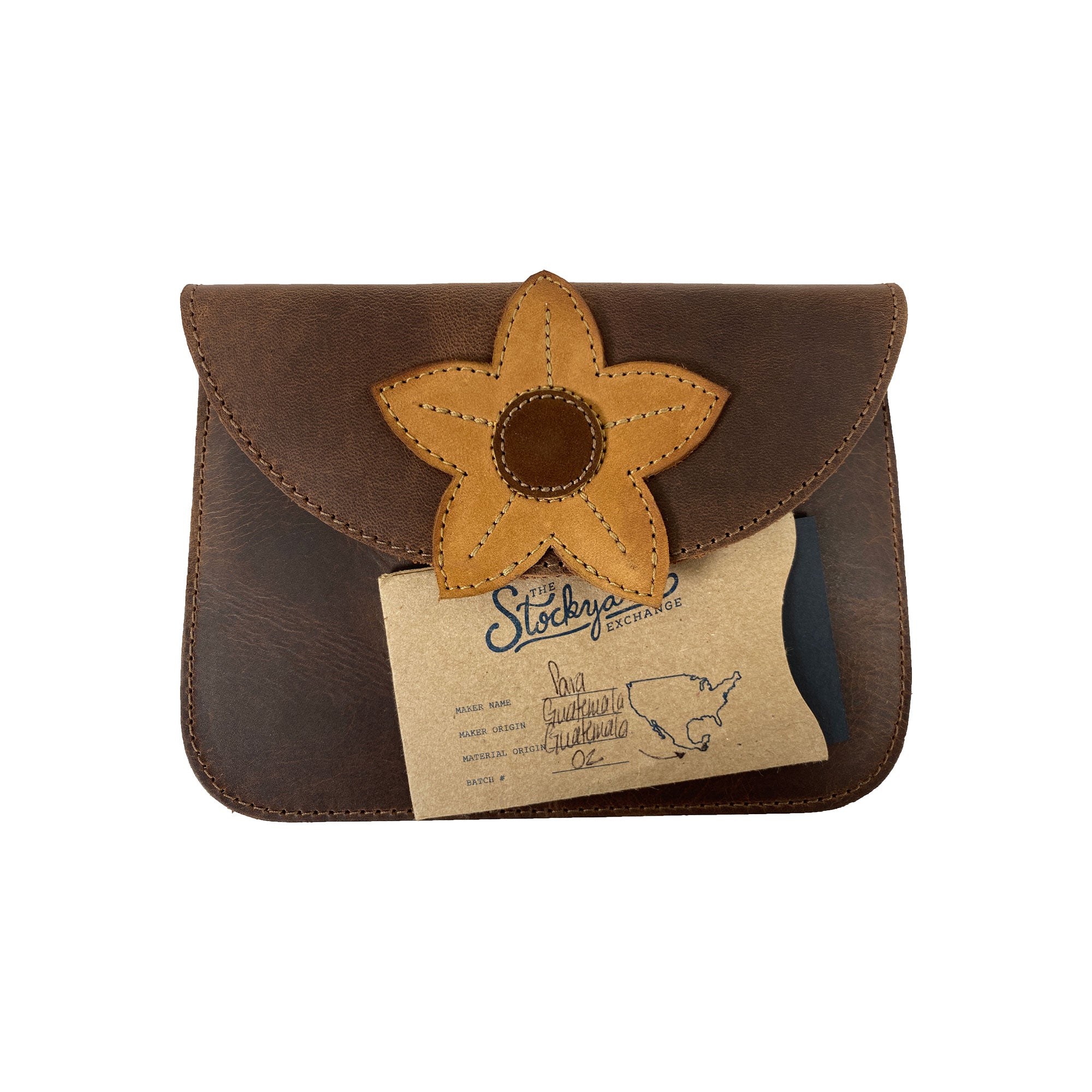 Heather's Flower Card Wallet containing cash and coins, emphasizing its practicality. Made from Full Grain Leather, this artisan wallet is handcrafted in La Antigua Guatemala.