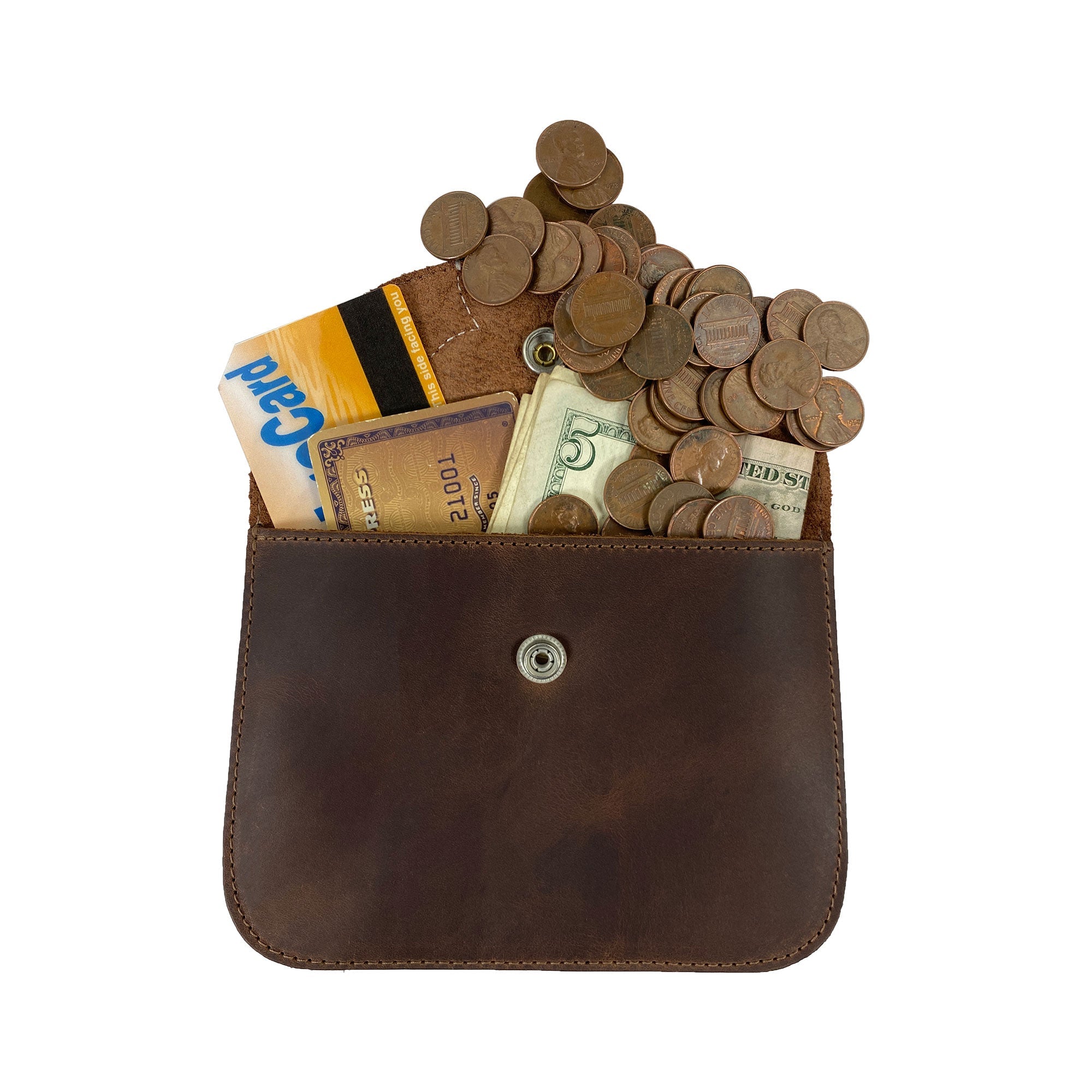 Heather's Flower Card Wallet filled with coins and cash, beautifully showcasing its practical design. Made from Full Grain Leather, this artisan product is hand sewn in La Antigua Guatemala.