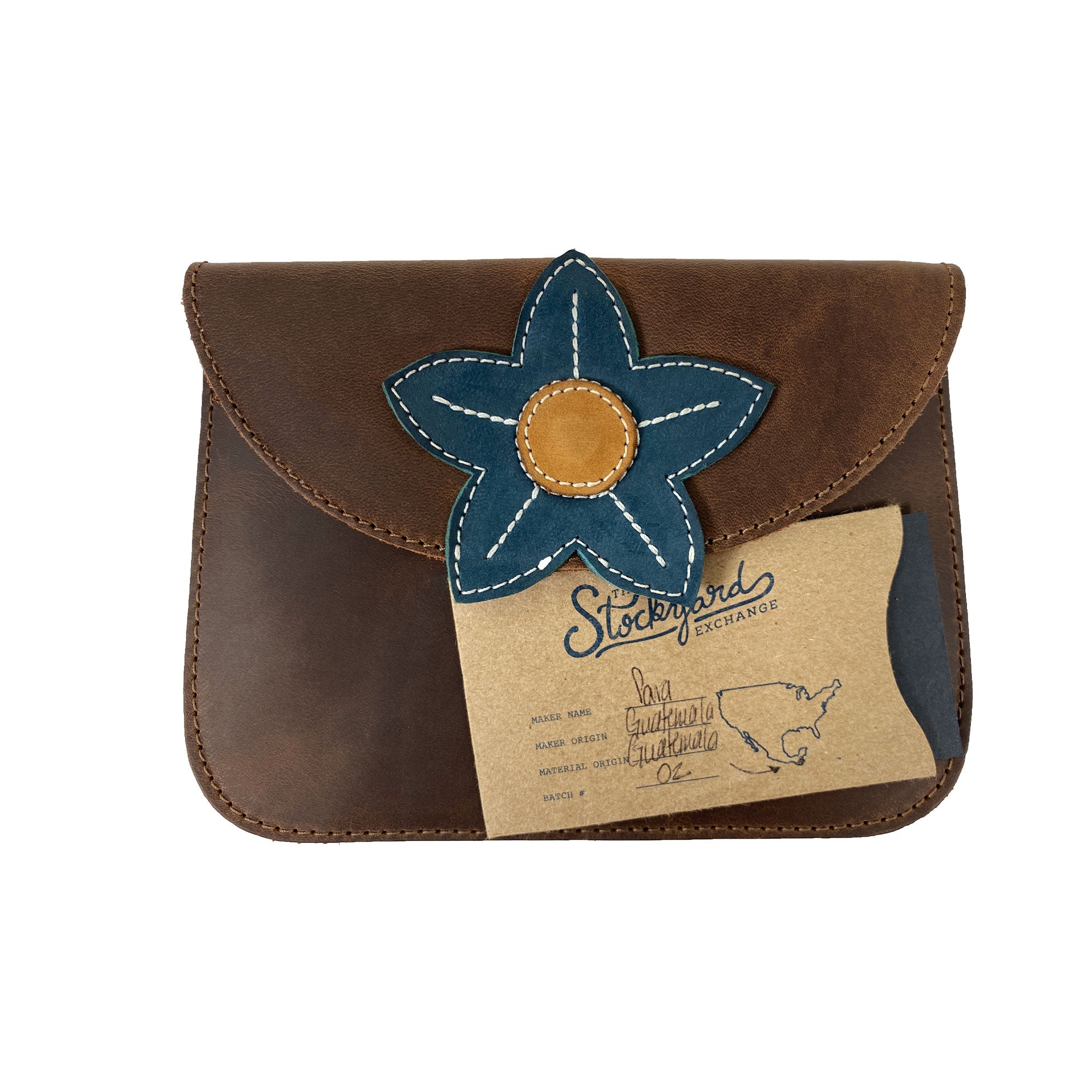 Heather's Flower Card Wallet with a note card, emphasizing its stylish appeal. Handcrafted in La Antigua Guatemala, this Full Grain Leather wallet supports local artisans.