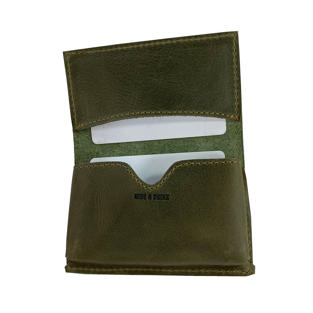 Front view of Hide & Drink's Vintage Card Holder in burgundy leather, showcasing its elegant design. This wallet serves as a vintage business card holder and cash organizer, skillfully made in small batches by artisans in La Antigua Guatemala & Oaxaca Mexico.