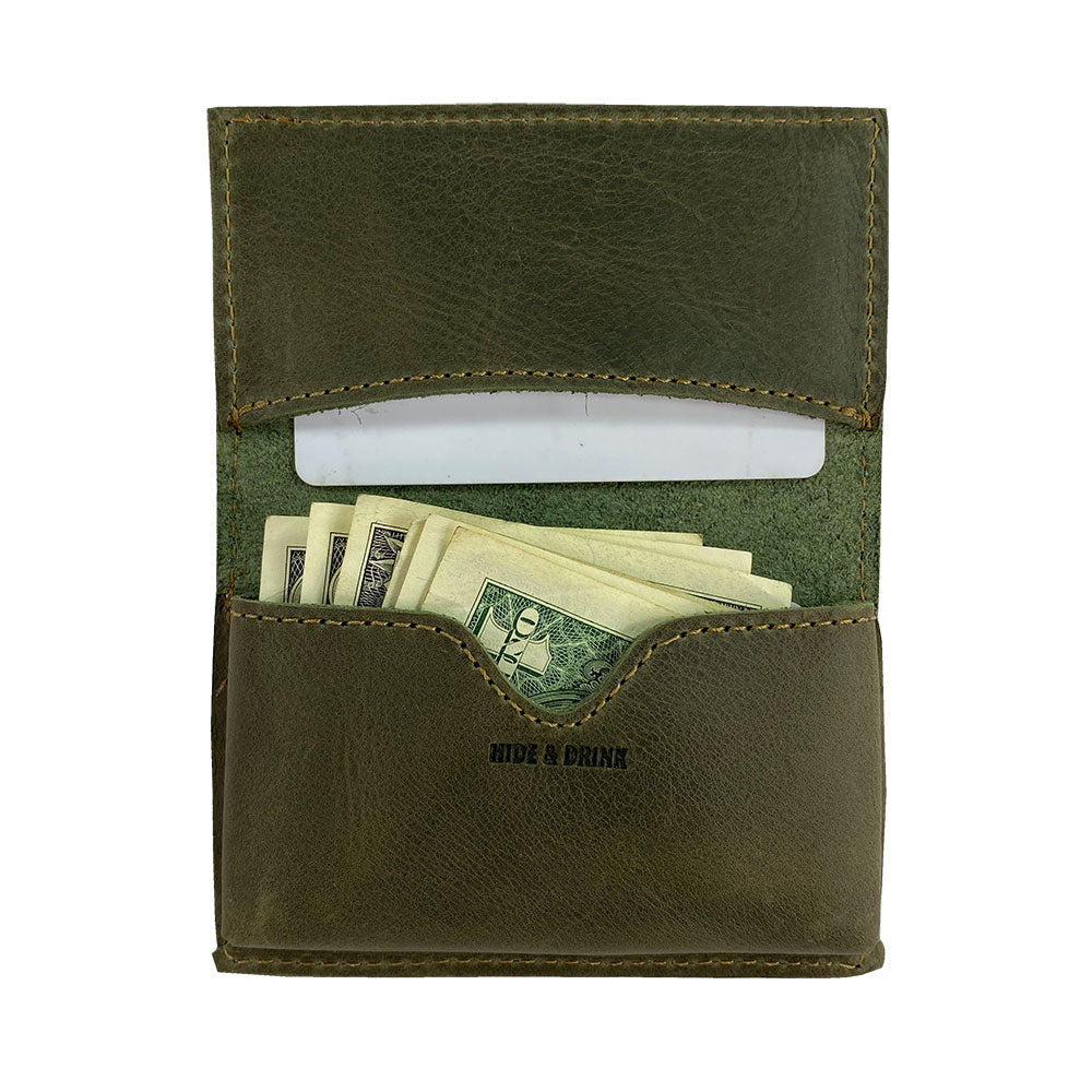Back view of Hide & Drink's Vintage Card Holder in burgundy leather, highlighting its quality and style. This durable wallet is perfect for organizing cash and business cards, handcrafted in La Antigua Guatemala & Oaxaca Mexico.