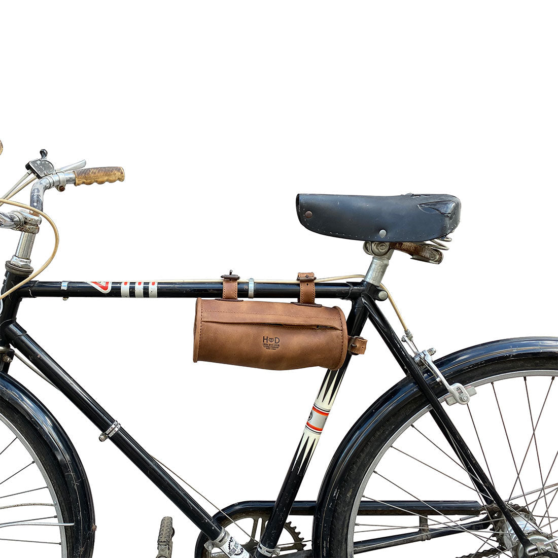 Hide & Drink Bike Bag mounted on a bicycle, showcasing its stylish design as a full grain leather cylinder tube pouch. This bicycle accessory is crafted with care, featuring hand cut and hand sewn quality, handmade in La Antigua Guatemala & Oaxaca Mexico.