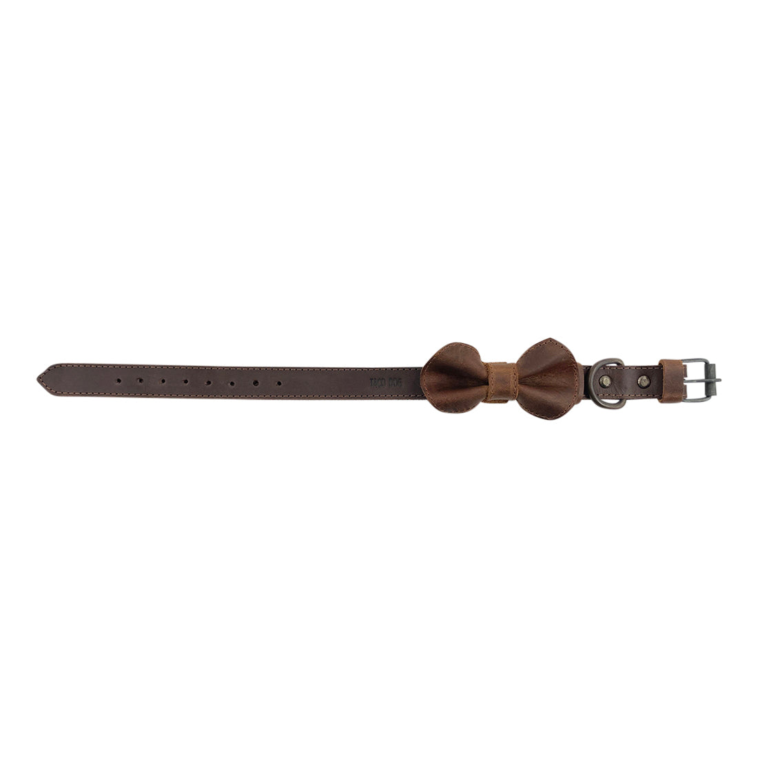 Flat lay of the Leather Bow Tie Collar by Taco Dog, displaying its full grain leather texture and stylish bow tie feature. This rustic collar is specifically designed for small dogs, offering a fashionable touch. Handmade through careful artisan techniques, it's a must-have pet accessory for dog lovers who appreciate quality and craftsmanship.