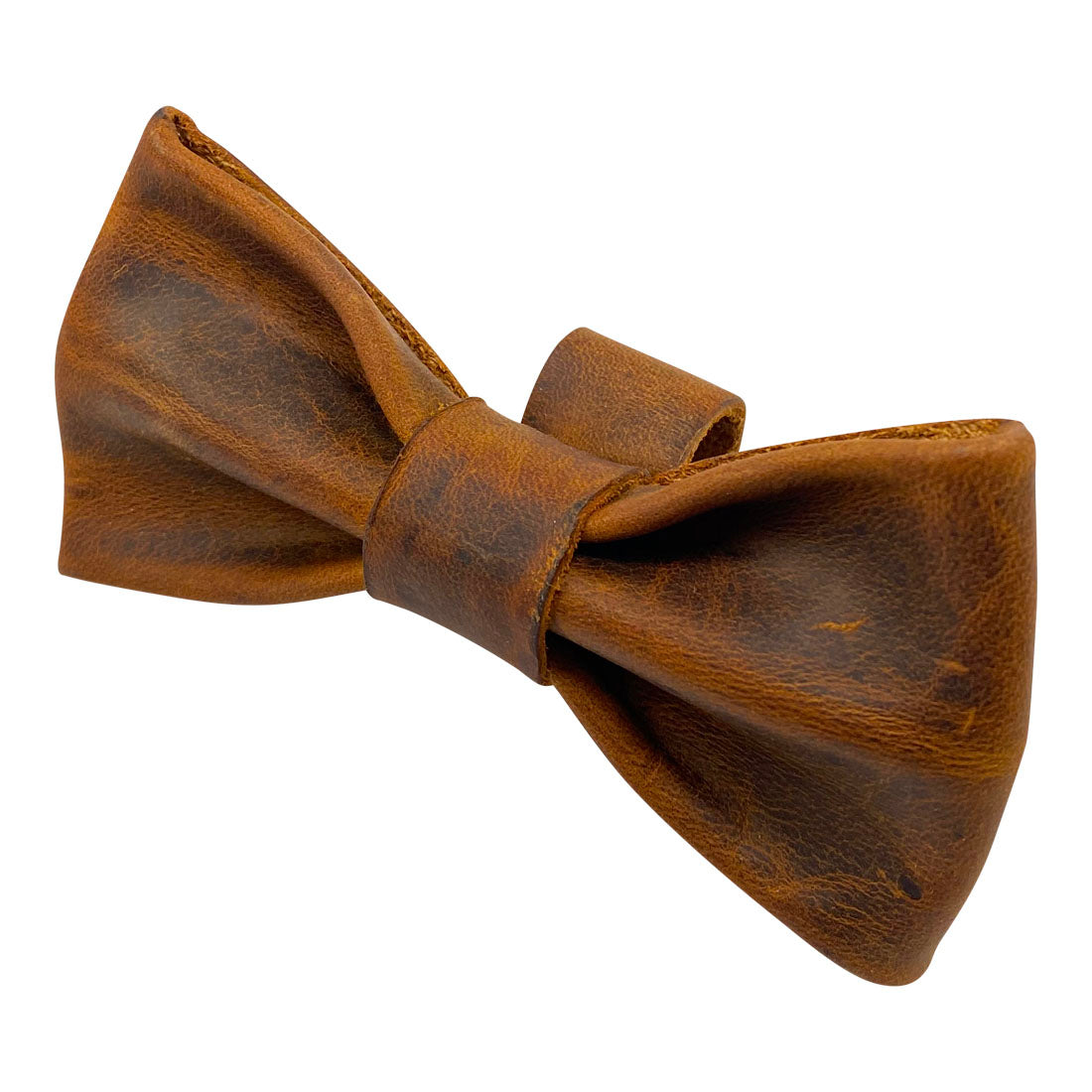 Another angle of the leather bow tie for dog collar by Taco Dog, highlighting its artisan design. This Bow Tie for Dog Collar is both functional and stylish, easily attaching to most collars (1.25 in. wide). Bow Tie for Dogs - Attaches onto Most Dog Collars (Collar Not Included) - Fancy Cute Stylish Pet Accessory Attachment, Full Grain Leather, StockyardX, Small Batch Production, Hand Cut, Hand Sewn, Fire Branded, Artisan, Handmade in La Antigua Guatemala & Oaxaca Mexico.
