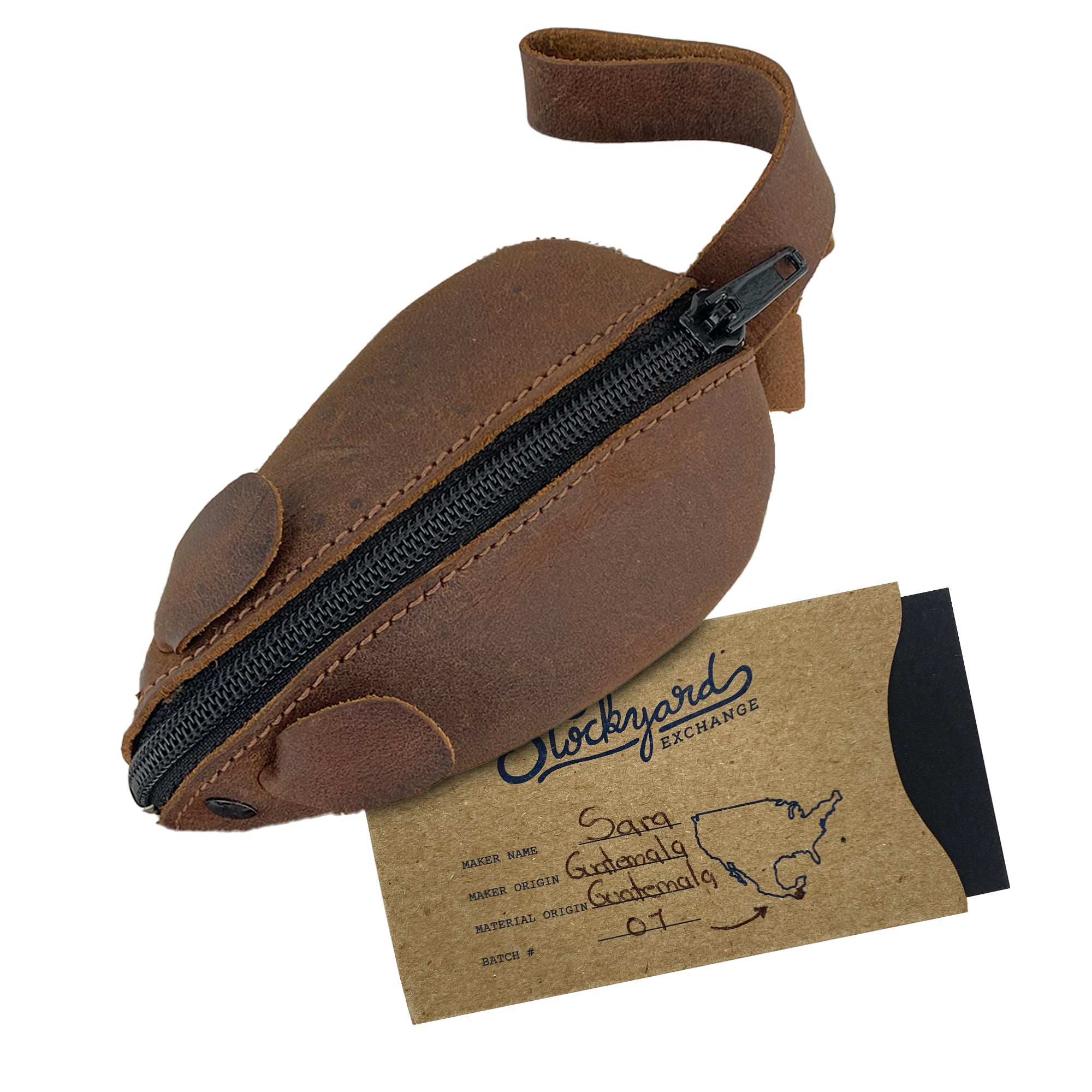 The Hide & Drink Mouse Coin Pouch displayed with its tag, representing quality craftsmanship from full grain leather. This unique mouse-shaped change pouch is a functional pocket case for coins, handmade in La Antigua Guatemala by skilled artisans.
