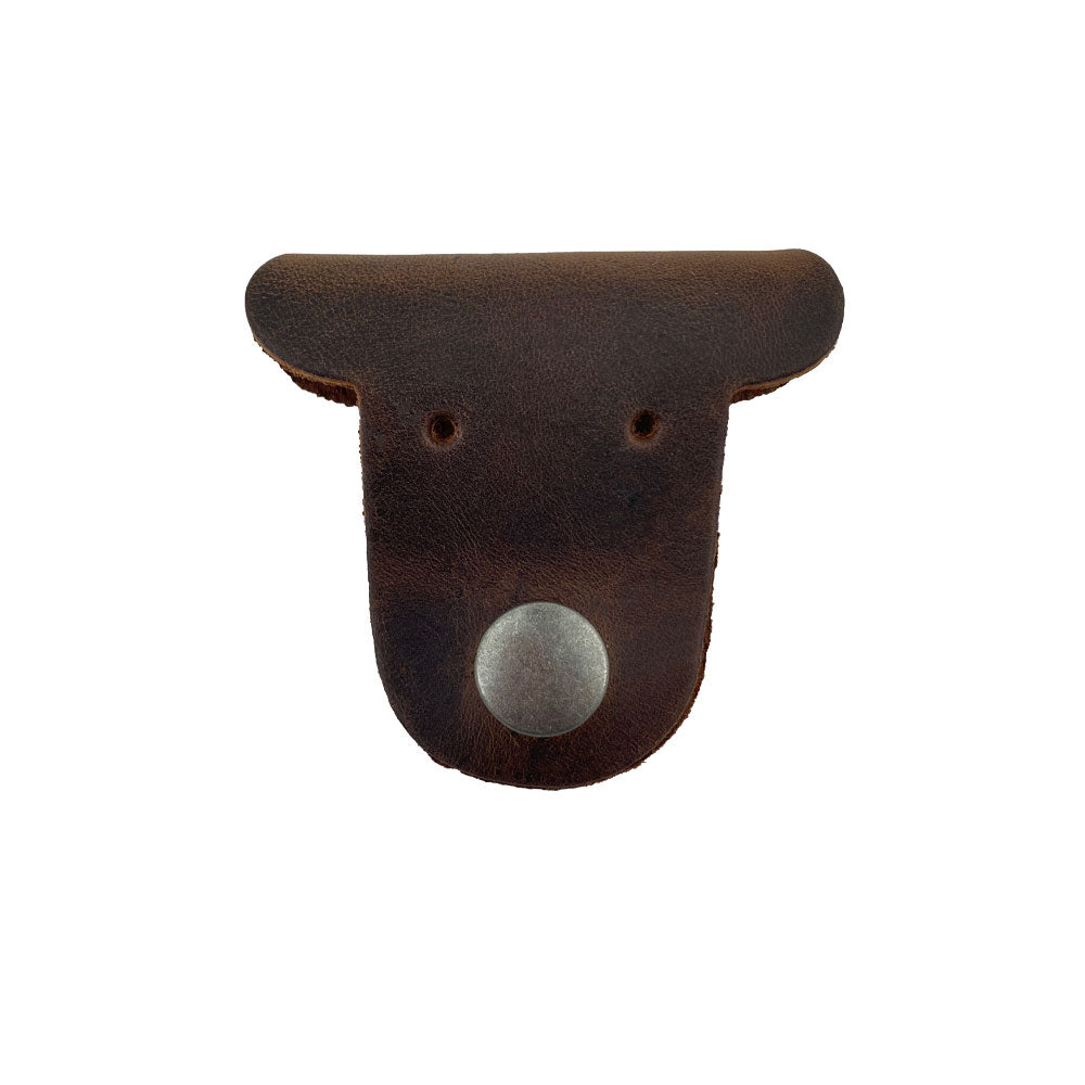 Two brown Dog Shaped Cord Keepers showcasing their elegant design from Hide & Drink, made for effective cord management with Full Grain Leather. Dog Shaped Cord Keeper (Cord Clam) 2-Pack, Full Grain Leather, StockyardX, Small Batch Production, Hand Cut, Hand Sewn, Fire Branded, Artisan, Handmade in La Antigua Guatemala & Oaxaca Mexico.