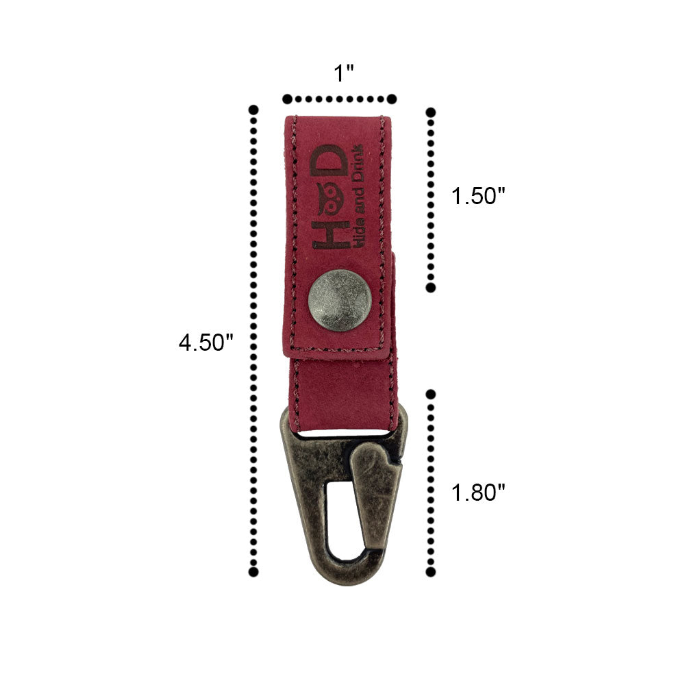 Close-up showcasing the dimensions of the red leather Key Ring Holder by Hide & Drink, emphasizing its compact and artisanal qualities. Key Ring Holder, Full Grain Leather, StockyardX, Small Batch Production, Hand Cut, Hand Sewn, Fire Branded, Artisan, Handmade in La Antigua Guatemala & Oaxaca Mexico.