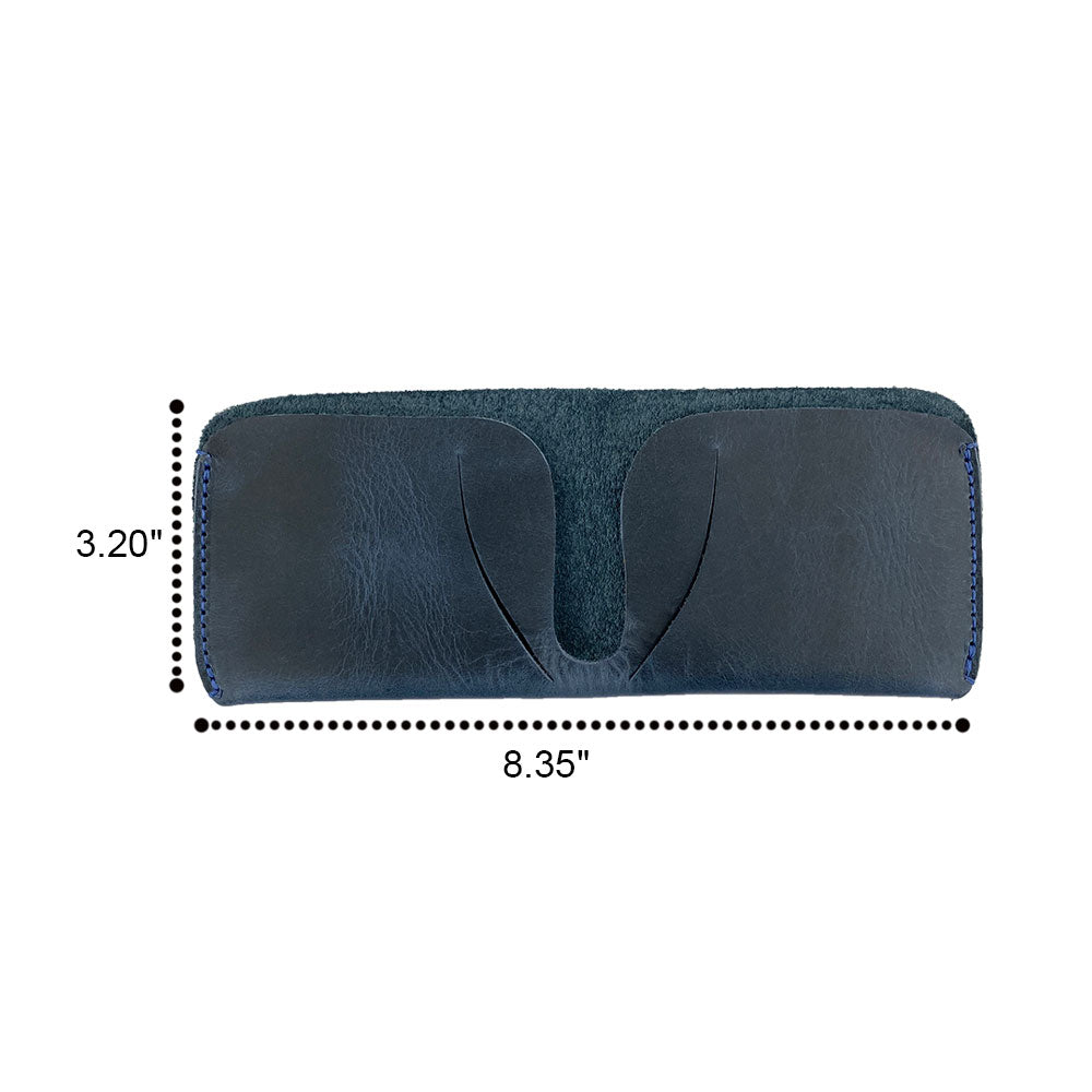 The Hide & Drink Minimal Wallet presented in deep green Full Grain Leather, illustrating its rustic appeal. This Classic Slimfold Wallet is a perfect Card Organizer Holder and Travel Accessory, crafted in Small Batch Production, featuring Hand Cut and Hand Sewn artistry by artisans in La Antigua Guatemala & Oaxaca Mexico.