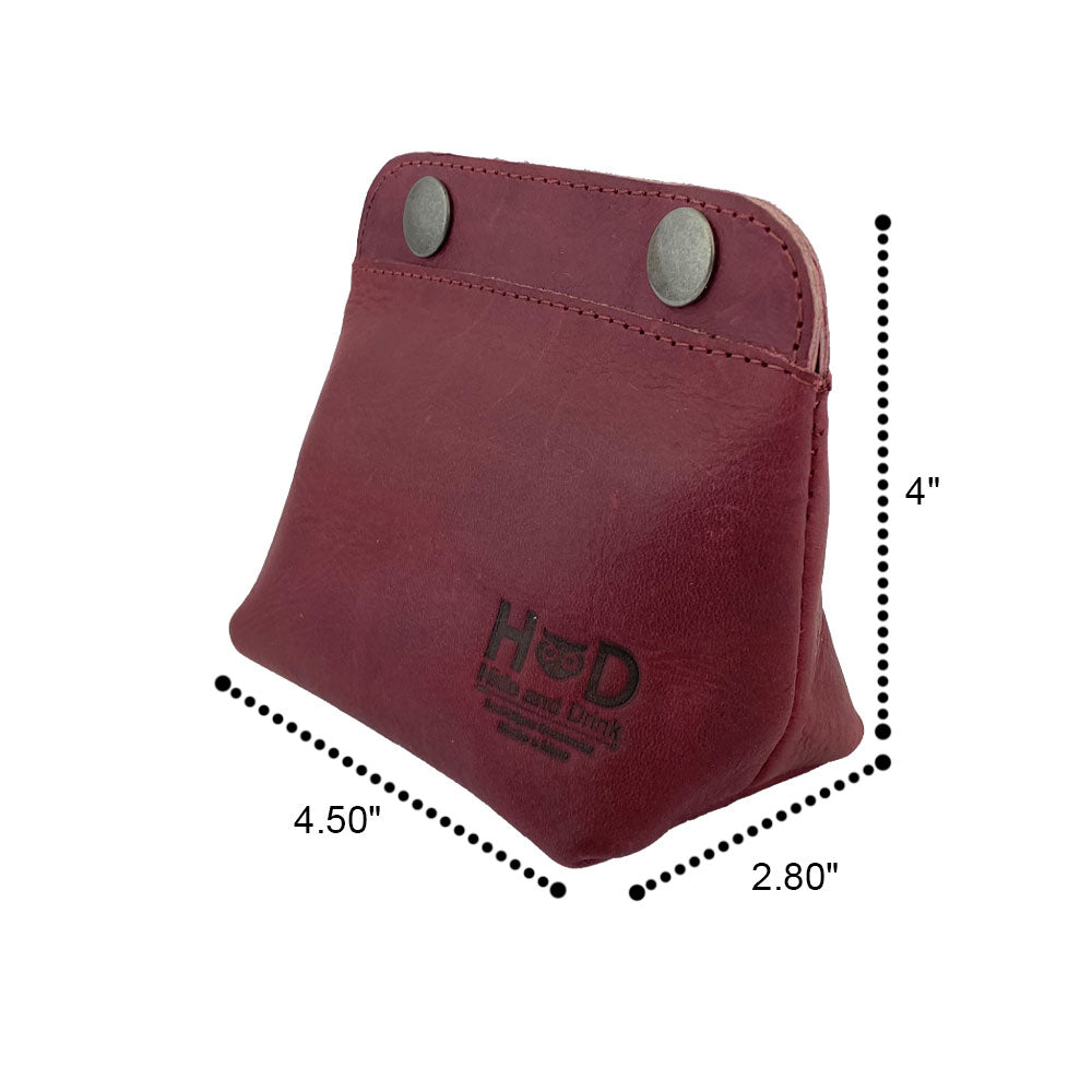 Hide & Drink Double Snap Pouch displaying its dimensions and functionality as a coin purse, cash & card holder, or makeup organizer. This handcrafted full grain leather item is made in La Antigua Guatemala.