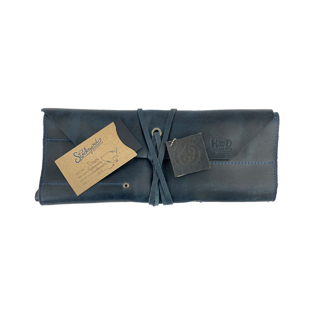 Hide & Drink Tool Roll (12 Pockets): Close-up view of the tool roll's pockets, showcasing the sturdy stitching and luxurious leather finish. Tool Bag Roll Up, 12 Slot Heavy Duty Tool Roll Bag Organizer, Tool Roll Up Bag, Portable Tool Wrap Roll Bags for Travel, Durable Tool Kit Folding Tool Pouch Roll Up Mechanic Gifts for Men, Full Grain Leather, StockyardX, Small Batch Production, Hand Cut, Hand Sewn, Fire Branded, Artisan, Handmade in La Antigua Guatemala & Oaxaca Mexico.