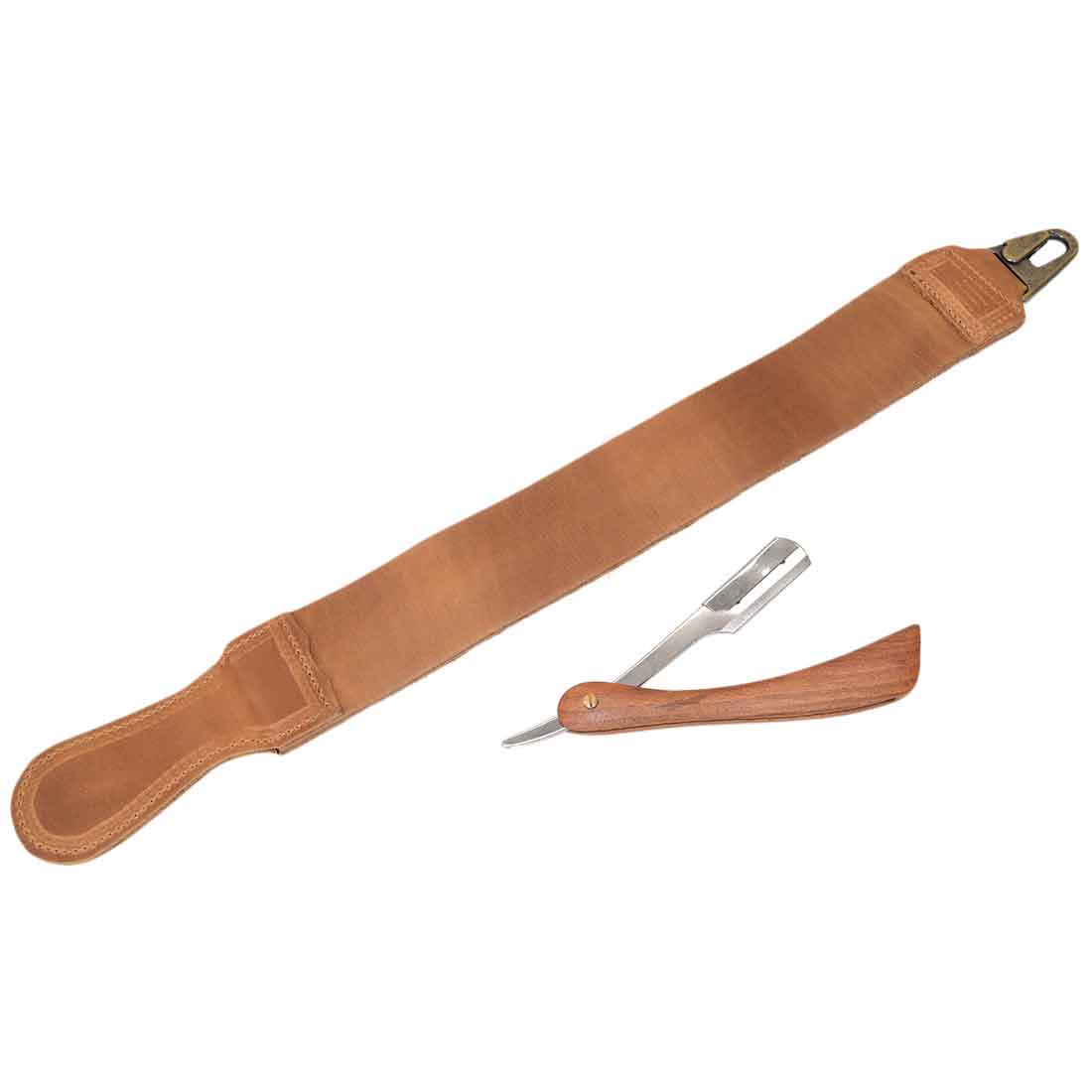 Hide & Drink's Barber Strop in a lighter leather, paired with a wooden straight razor. This premium Full Grain Leather shaving sharpener exemplifies small batch artisan production, perfect for professional barbers.