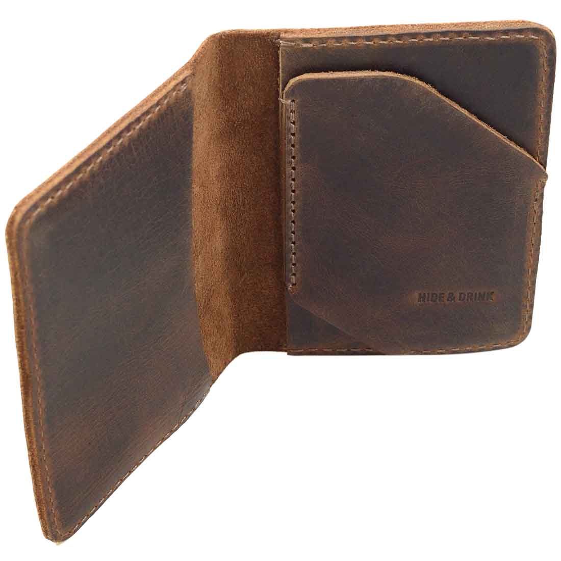 Side view of the Bi-Fold Card Wallet Diagonal by Hide & Drink displaying its sturdy construction and attractive full grain leather, illustrating the handmade quality from La Antigua Guatemala and perfect as a cash organizer.