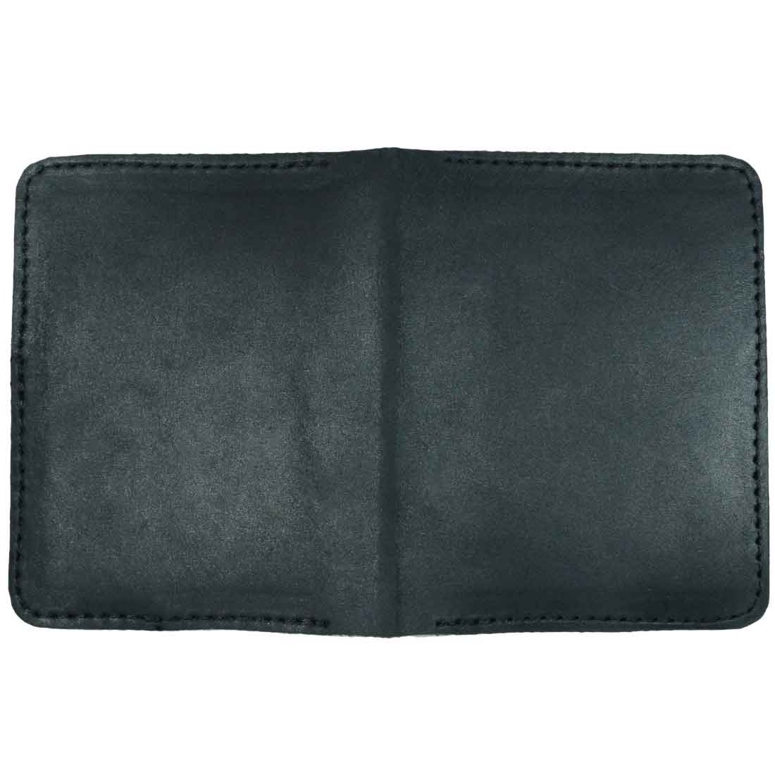 Empty black Bi-Fold Card Wallet Diagonal by Hide & Drink, highlighting clean lines and full grain leather finish, reflecting the artisanal quality and small batch production behind this stylish cash organizer.