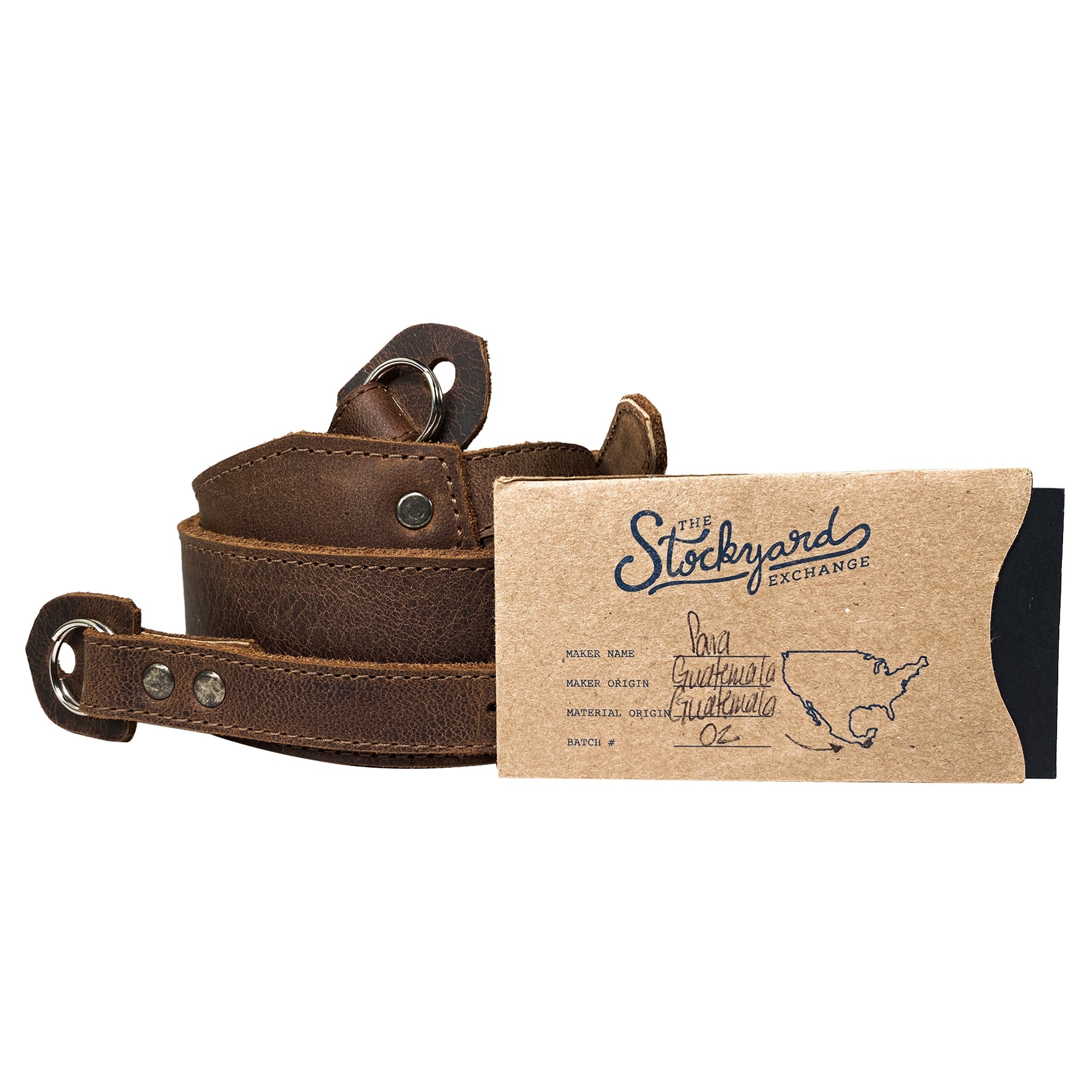 Hide & Drink Rustic Camera Strap presented with its packaging, highlighting the attention to detail and craft. Made from Full Grain Leather, this adjustable strap suits mirrorless and compact cameras perfectly, making it an ideal gift for photographers. StockyardX, Small Batch Production, Hand Cut, Hand Sewn, Fire Branded, Artisan, Handmade in La Antigua Guatemala & Oaxaca Mexico.
