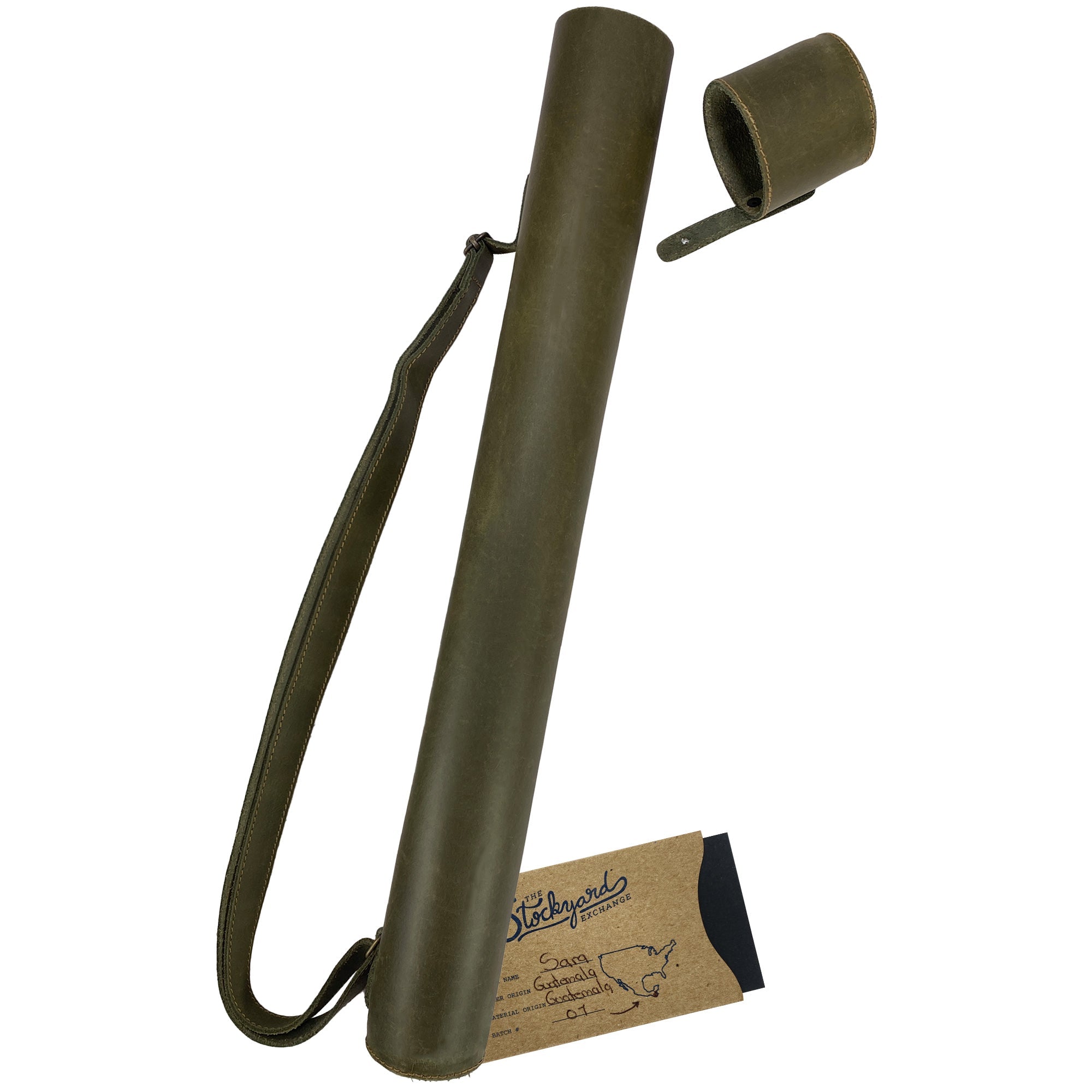 Hide & Drink's Blueprint Tube (A2 Paper Size) shown with plans for professionals in navy leather. This document storage tube includes an adjustable strap, showcasing the artisan quality and small batch production by StockyardX, handmade in La Antigua Guatemala & Oaxaca Mexico.