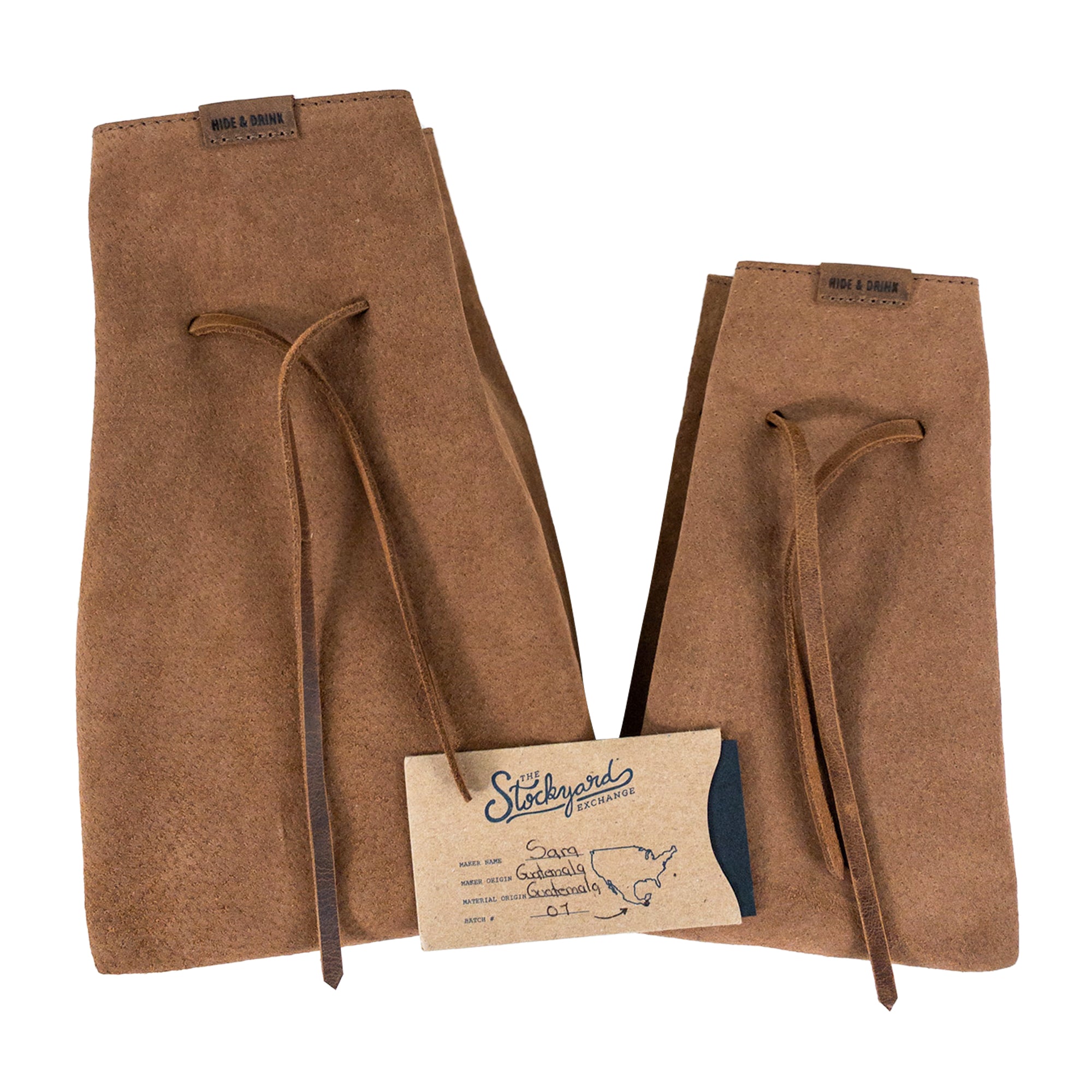Introducing Hide & Drink's Drawstring Sack (2 pack) in classic black, ideal for stylishly storing and organizing your items. Drawstring Sack (2 pack) Handmade from Sheepskin and Full Grain Leather, StockyardX, Small Batch Production, Hand Cut, Hand Sewn, Fire Branded, Artisan, Handmade in La Antigua Guatemala & Oaxaca Mexico.