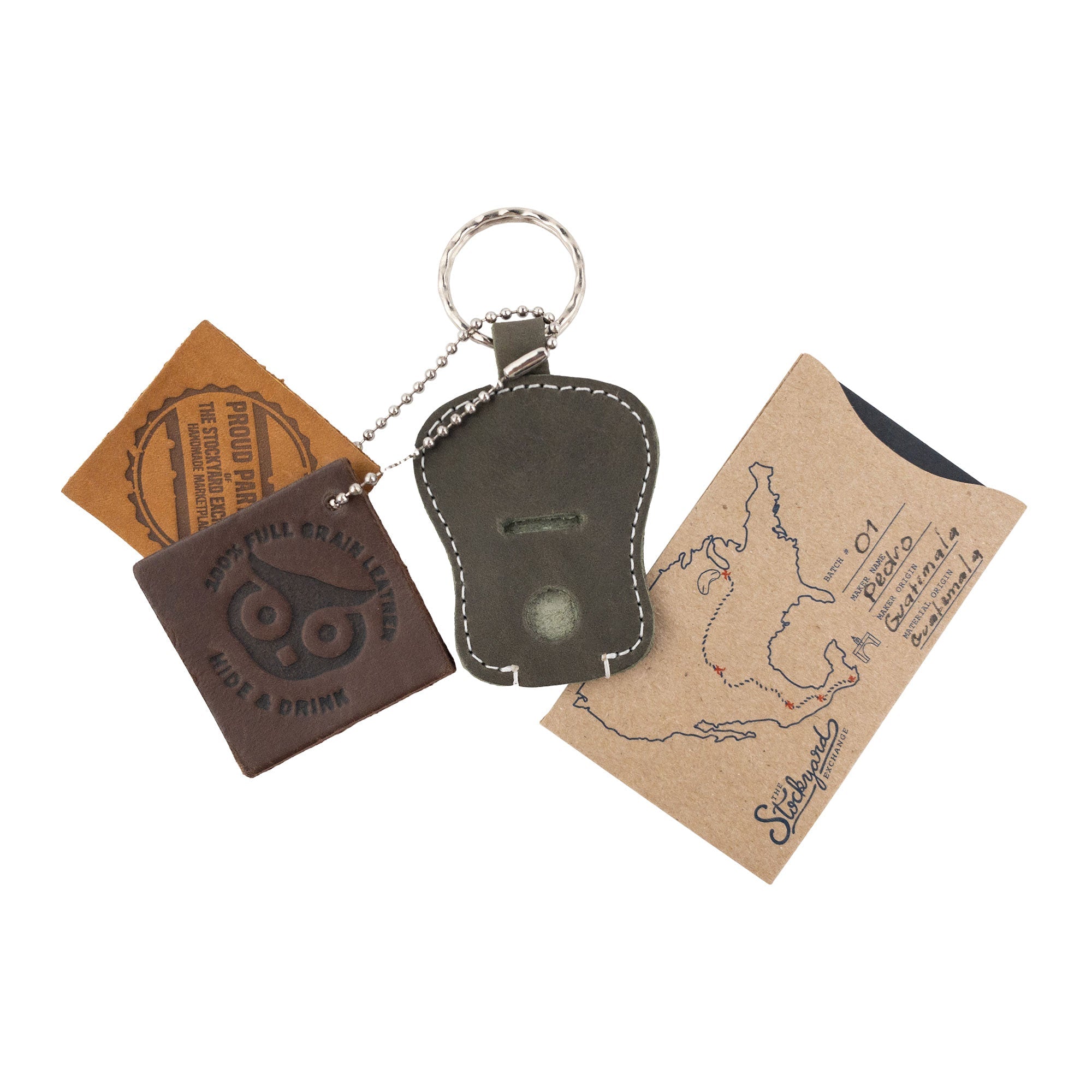 Earthy Guitar Keychain by Hide & Drink in a detailed view, highlighting its design for key management. Handmade from Full Grain Leather, this keyring showcases quality artisan craftsmanship from La Antigua Guatemala & Oaxaca Mexico.
