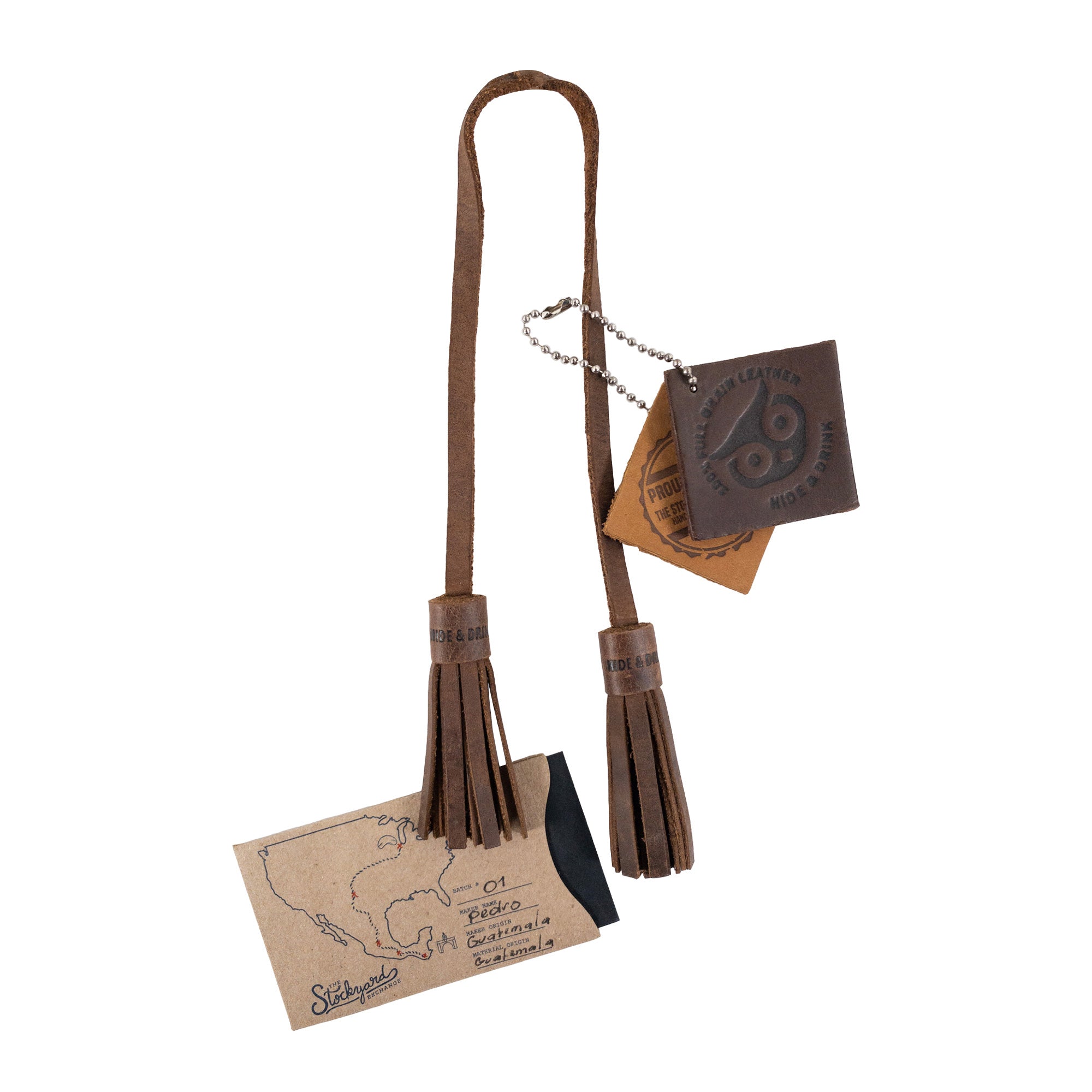 Hide & Drink Bag Accessory / Tassels alongside leather tags, emphasizing the artisanal craftsmanship and quality of materials. An ideal accessory for unique bag styling. Labrador Ornament (2 Pack) / Hanging Labrador Decoration/Dog Ornament/Hanging Decoration for Purses, Handbags & Backpacks, Full Grain Leather, StockyardX, Small Batch Production, Hand Cut, Hand Sewn, Fire Branded, Artisan, Handmade in La Antigua Guatemala & Oaxaca Mexico.
