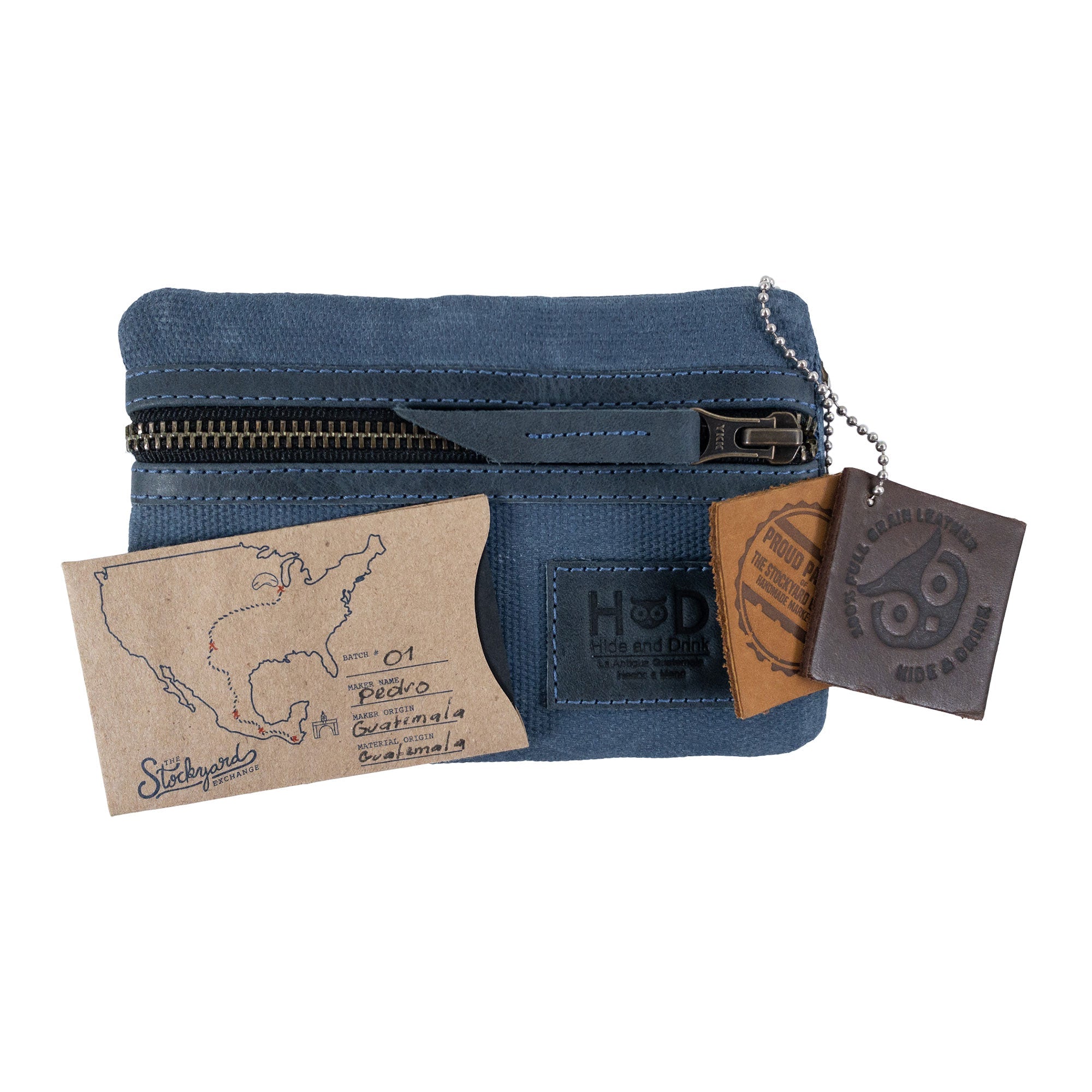 Packaging of the green Multi-tool Pocket Pouch by Hide & Drink, emphasizing artisan craftsmanship with quality tags.