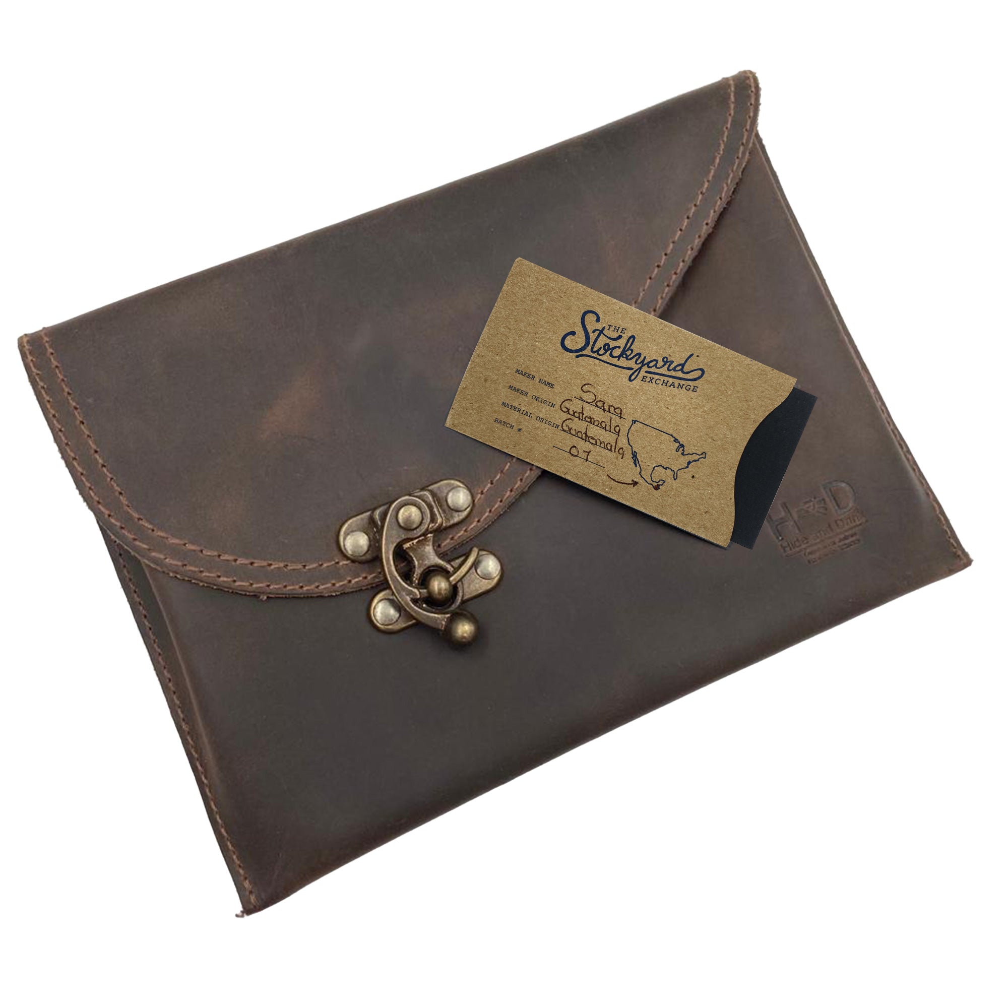 Vintage Clutch Bag from Hide & Drink with a price tag, representing artisan craftsmanship in Full Grain Leather, designed for style and functionality, handmade in Oaxaca Mexico.
