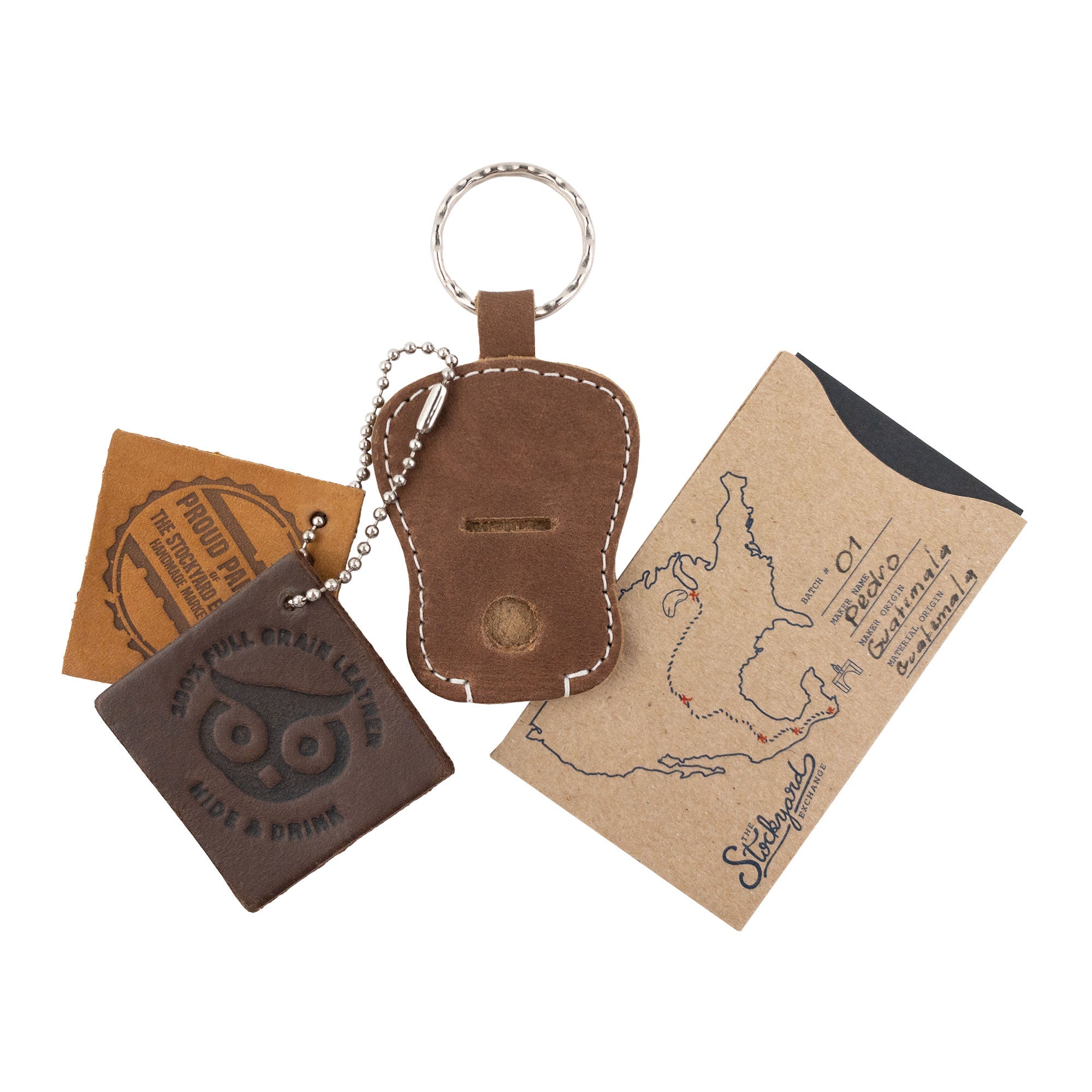 Guitar Keychain by Hide & Drink focusing on its unique design features for key storage. Handmade from high-quality Full Grain Leather, showcasing artisan skills from small batch production in La Antigua Guatemala & Oaxaca Mexico.