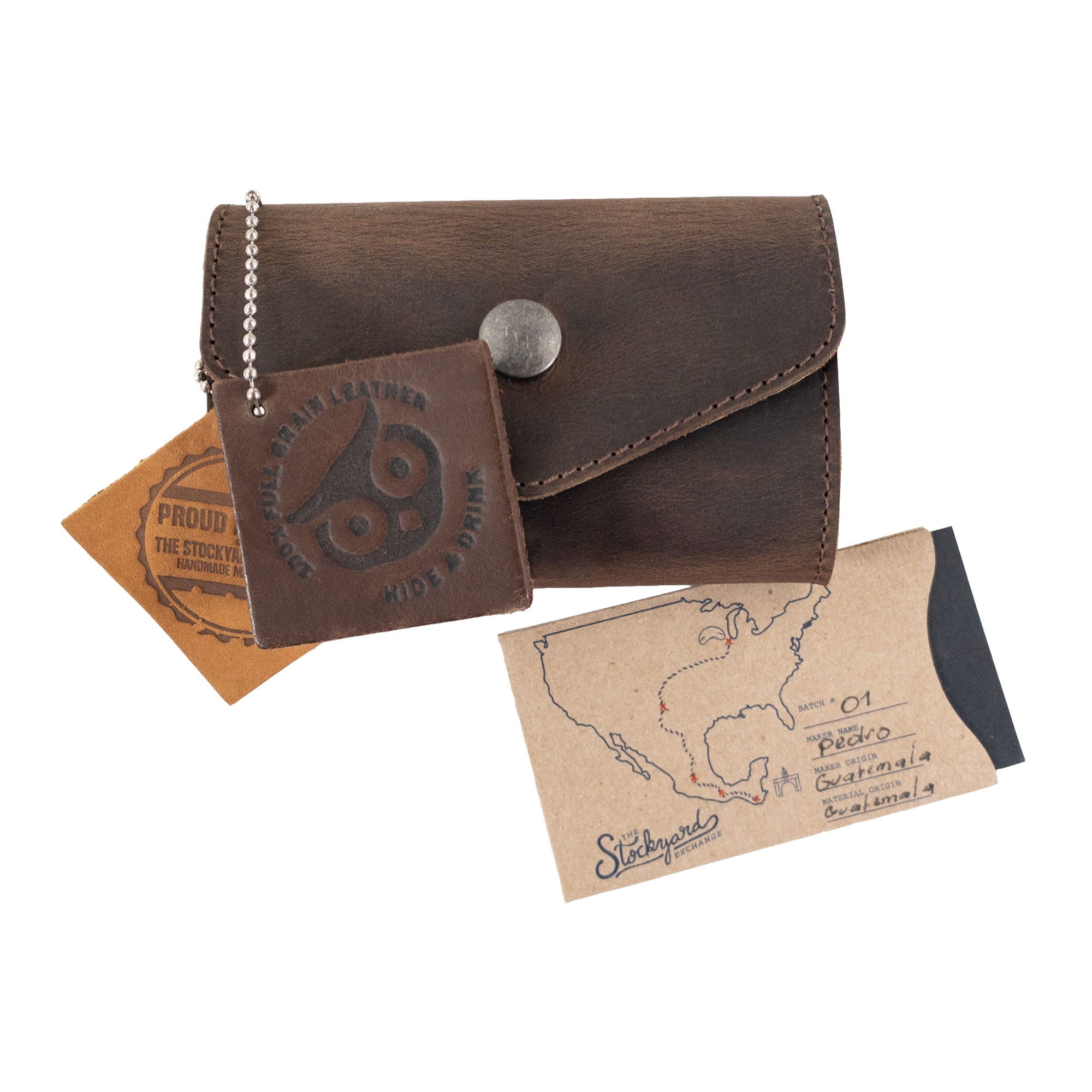 Nail Clipper Roll Case by The Stockyard Exchange showcased with its packaging, highlighting its artisanal qualities and craftsmanship. This rustic Full Grain Leather roll is an excellent Nail Clipper Set Case, perfect for travel. Handmade in La Antigua Guatemala, each piece emphasizes hand-cut, hand-sewn techniques and unique artisan craftsmanship.