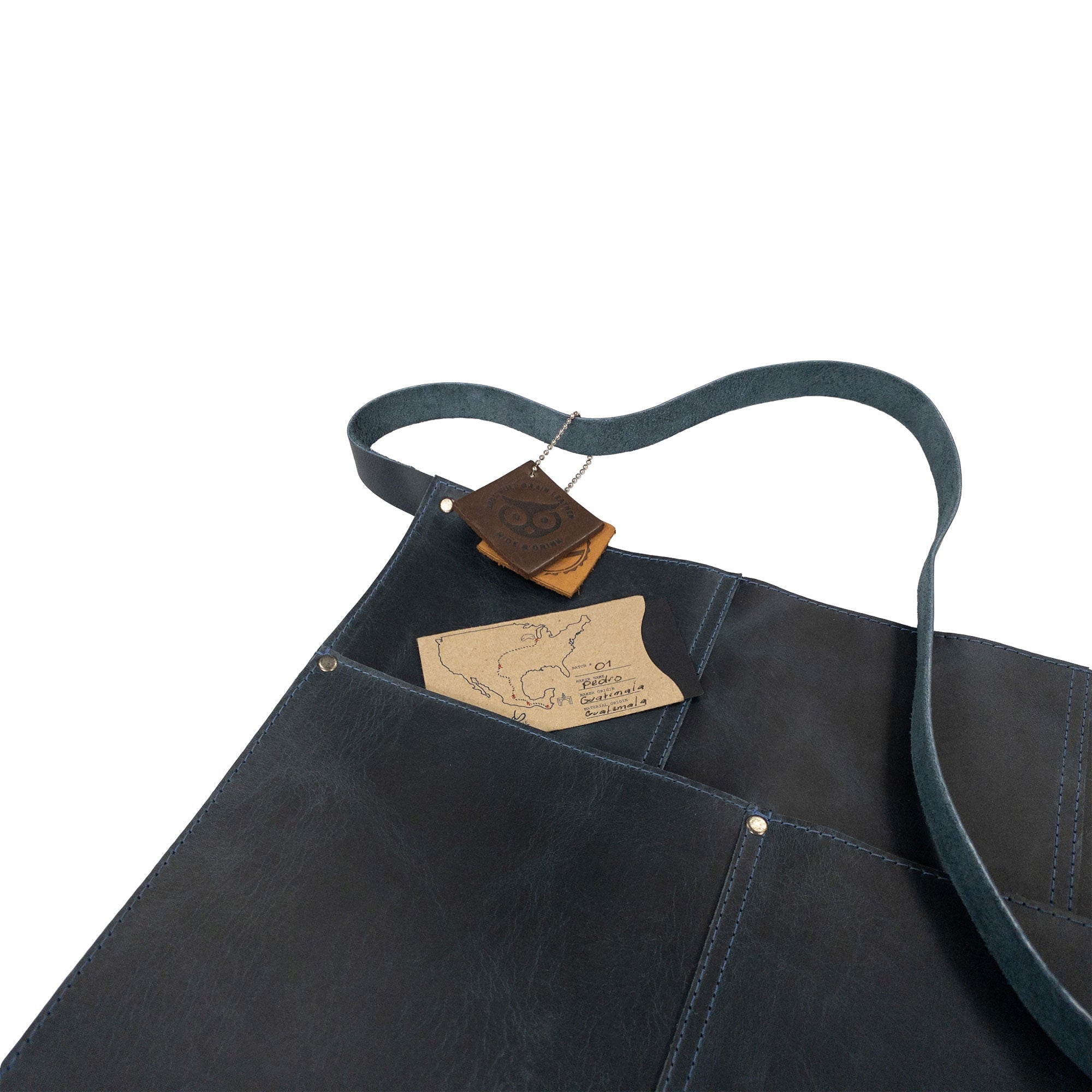 Hide & Drink Barista Leather Waist Apron featuring a unique design with riveted pockets suitable for server shorts. Made from quality full grain leather through small batch production in La Antigua Guatemala & Oaxaca Mexico.