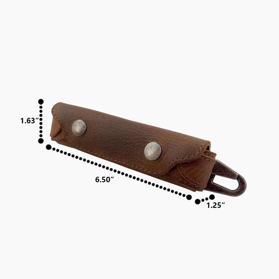 Dimensions of Hide & Drink’s Harmonica Case, showing its compact size ideal for travel. Made from durable full grain leather, this vintage style protector is a must-have for musicians. Crafted artisanally in La Antigua Guatemala, ensuring quality through small batch production.
