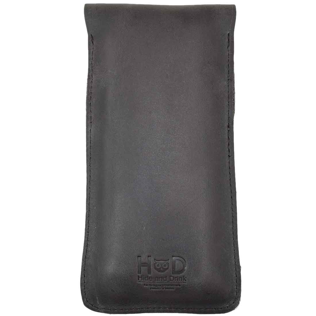 Hide & Drink Cigar Holder featuring a leather exterior, designed to hold three cigars in a slim profile. This classic all-purpose holder is crafted from rustic full grain leather, reflecting small batch artisan production and hand sewn quality from La Antigua Guatemala.