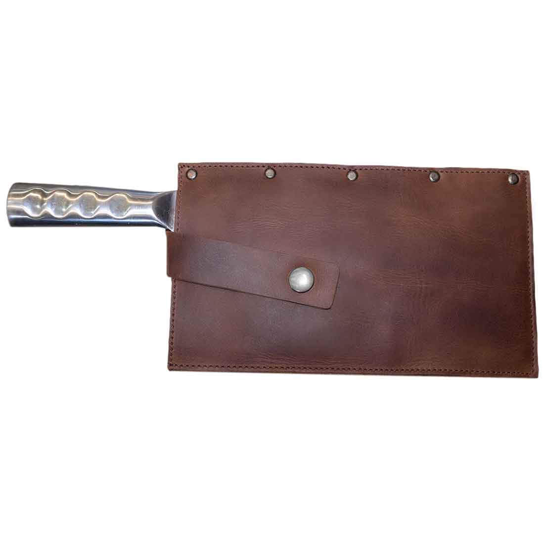 Hide & Drink Butcher Knife Holster showcasing a rustic full grain leather sheath designed for cleaver butcher knives, featuring a handmade finish that emphasizes quality and craftsmanship from artisan makers in La Antigua Guatemala & Oaxaca Mexico. This stylish and durable artisan piece is a must-have for kitchen essentials, ensuring a proper blade cover for your kitchen tools.