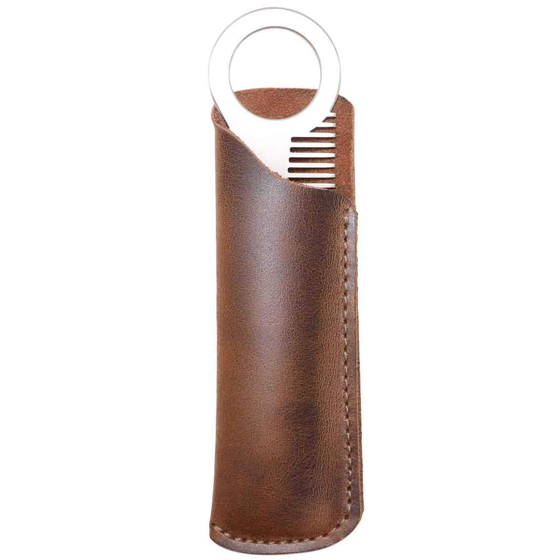 Hide & Drink Comb Case featuring a rustic design, perfect for protecting your comb. This stylish leather sleeve is a great addition to personal care and barber accessories. Made from full grain leather, it represents small batch production and artisan craftsmanship. Handmade in La Antigua Guatemala & Oaxaca Mexico.