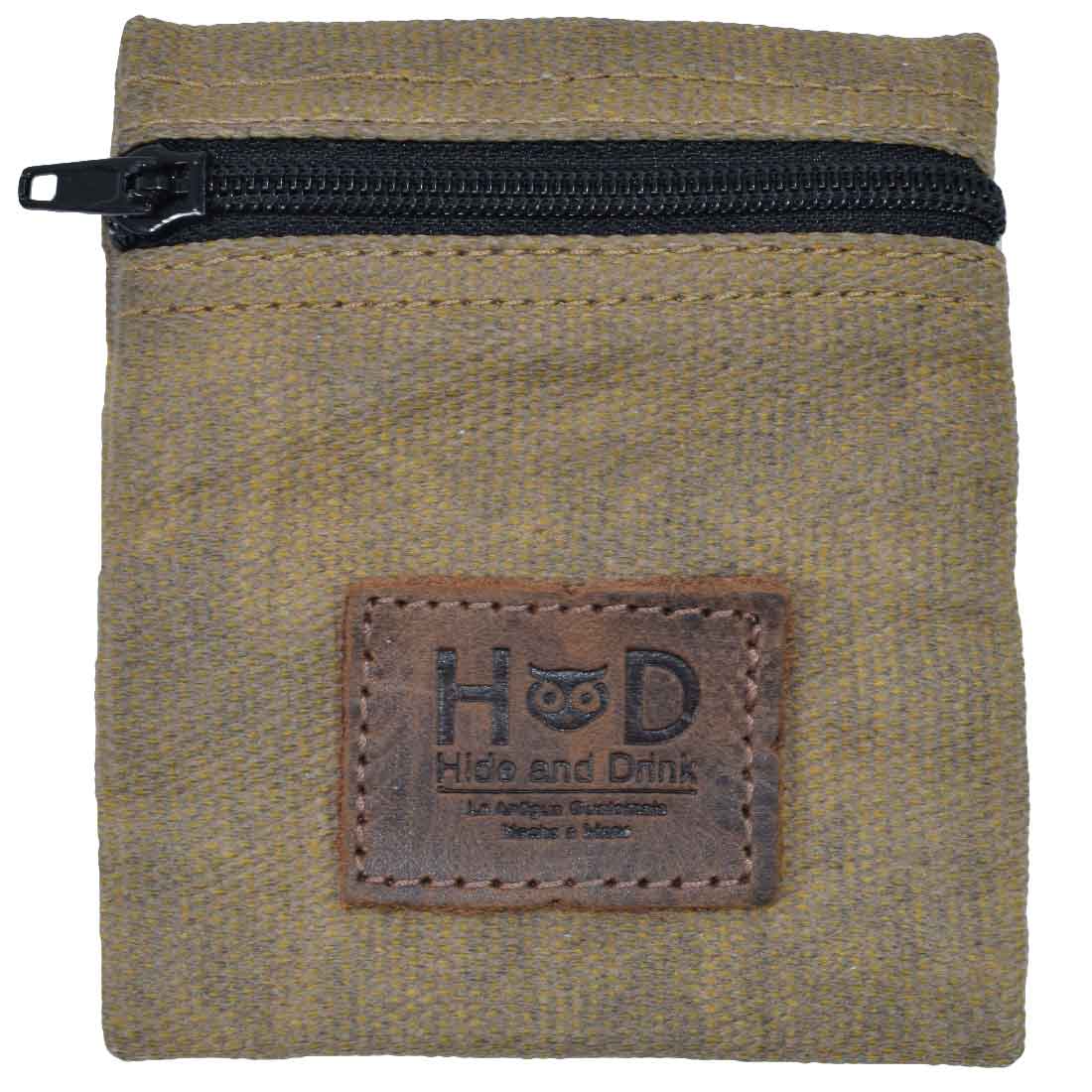 Hide & Drink Condom Pouch emphasizing its solid design, crafted from water resistant waxed canvas. A great classic partner gift and travel essential, this handmade item is perfect for storing small valuables. Made in La Antigua Guatemala, showcasing artisan quality through small batch production.