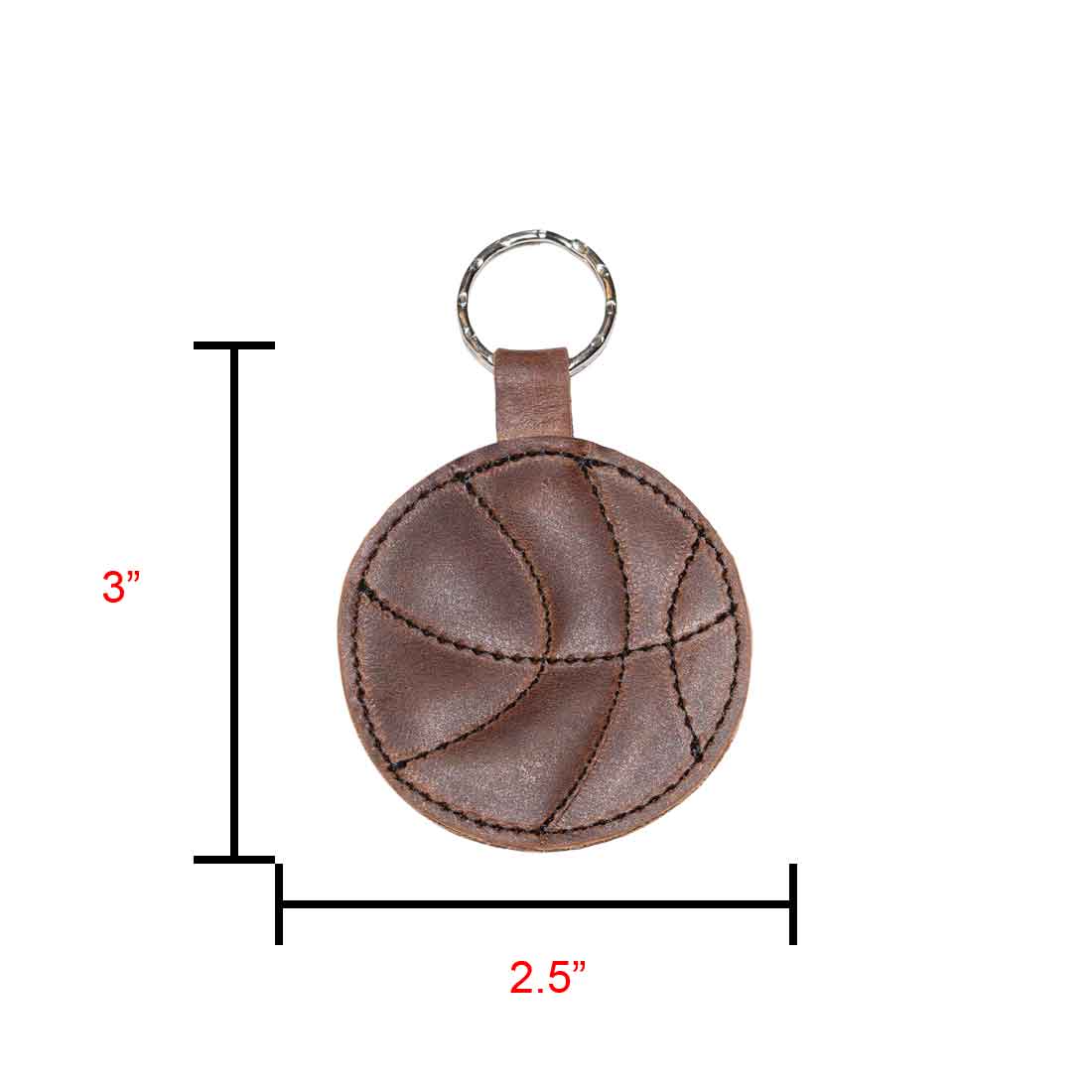 Dimensions of the Basketball Keychain by Hide & Drink displayed next to a ruler, illustrating its compact size. A perfect key ring for sports enthusiasts, crafted from full grain leather, ideal as a gift for players and handmade in La Antigua Guatemala & Oaxaca Mexico.